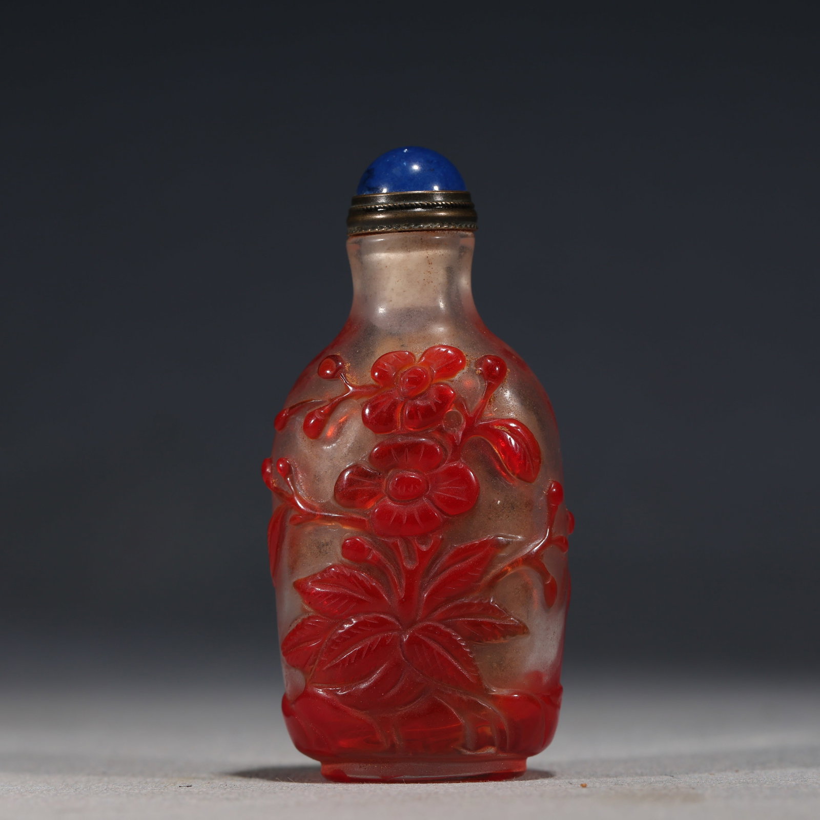An Exquisite Overlaid Red Glass Snuff Bottle With Floral Pattern: An Exquisite Overlaid Red Glass Snuff Bottle With Floral Pattern,China,Qing Dynasty,Four-Character Qianlong