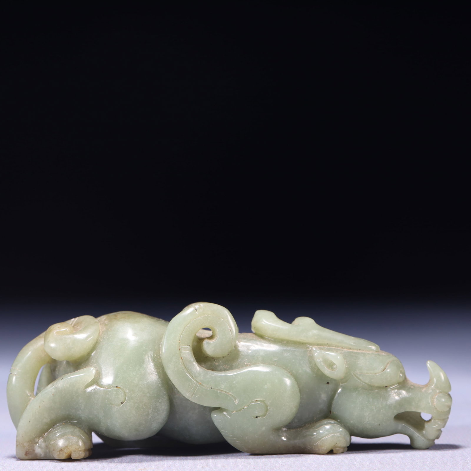 An Exquisite Green Jade Beast Ornament: An Exquisite Green Jade Beast Ornament,Qing Dynasty,China,Size:4.7inx1.6inx1.4in,Weight:271g 青玉兽摆件,中国清代