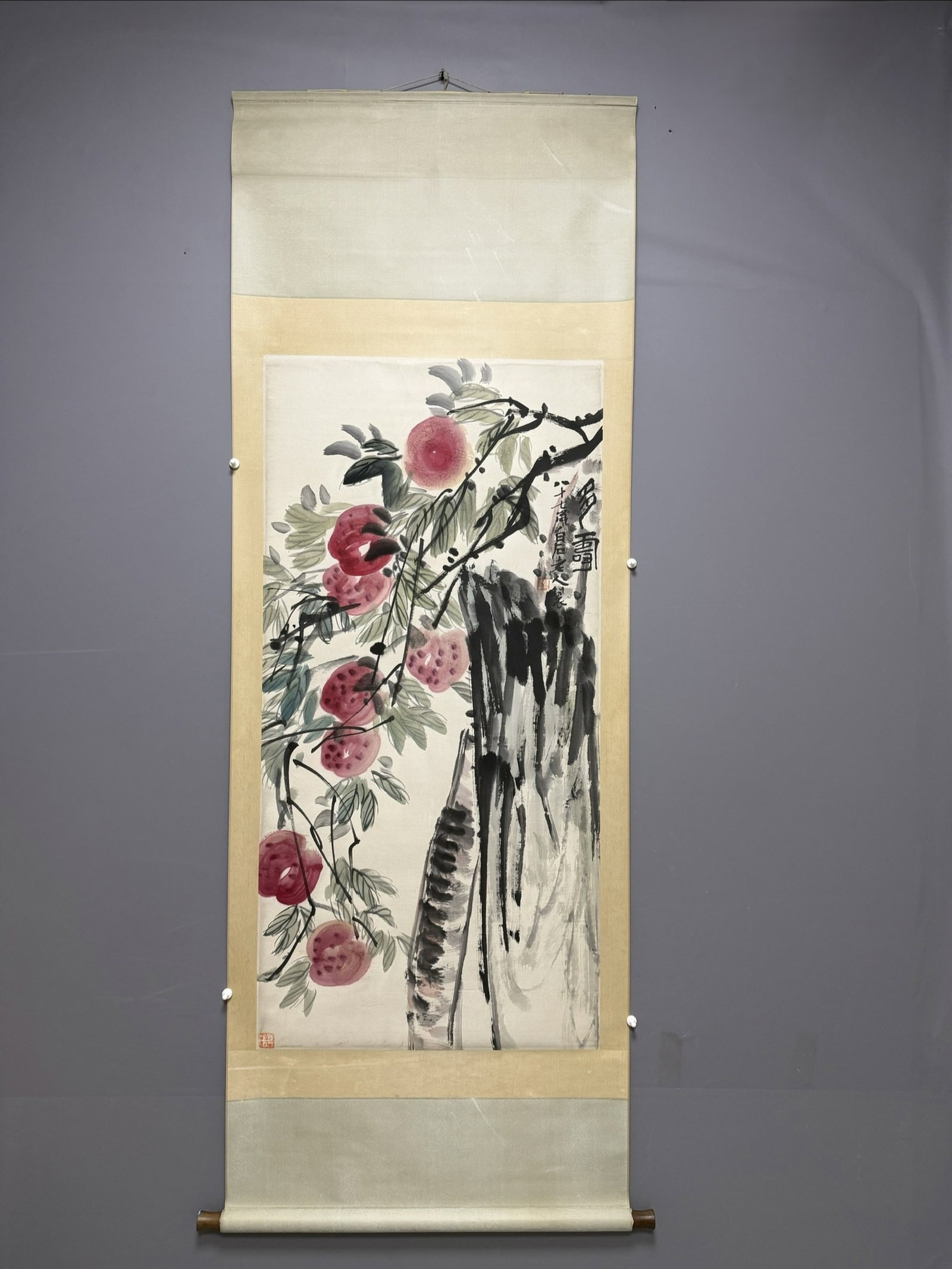 A Chinese Vertical Scroll Ink Painting of Peach on Paper: A Chinese Vertical Scroll Ink Painting of Peach on Paper,Qi Baishi,Size:54.3inx26.8in 一幅中国水墨桃子画立轴,齐白石