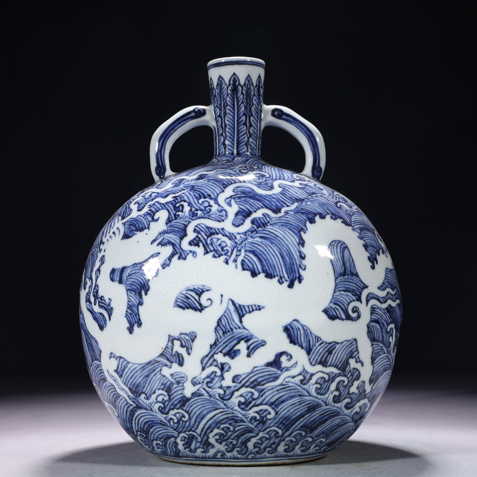 An Exquisite Blue and White Seawater and Dragon Pattern Double-Ears Vase: An Exquisite Blue and White Seawater and Dragon Pattern Double-Ears Vase,Ming Dynasty,China,Size:7.9inx5.1inx11.4in,Weight:2350g