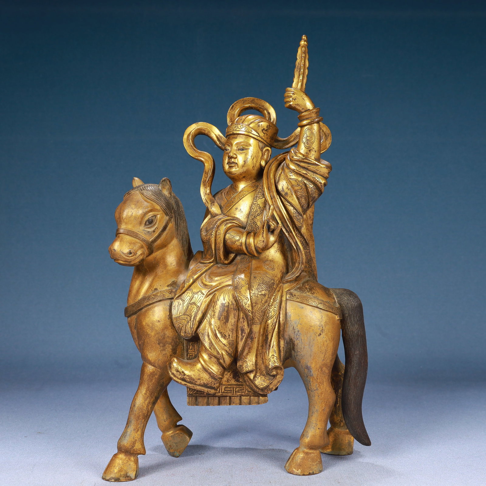 A Solemn Gilt Bronze Statue of Dharma Protector Rides the Horse: A Solemn Gilt Bronze Statue of Dharma Protector Rides the Horse,Qing Dynasty, China,Size:7.9inx3.1inx13.8in,Weight:6900g 铜鎏金骑马护法像,中ࢲ
