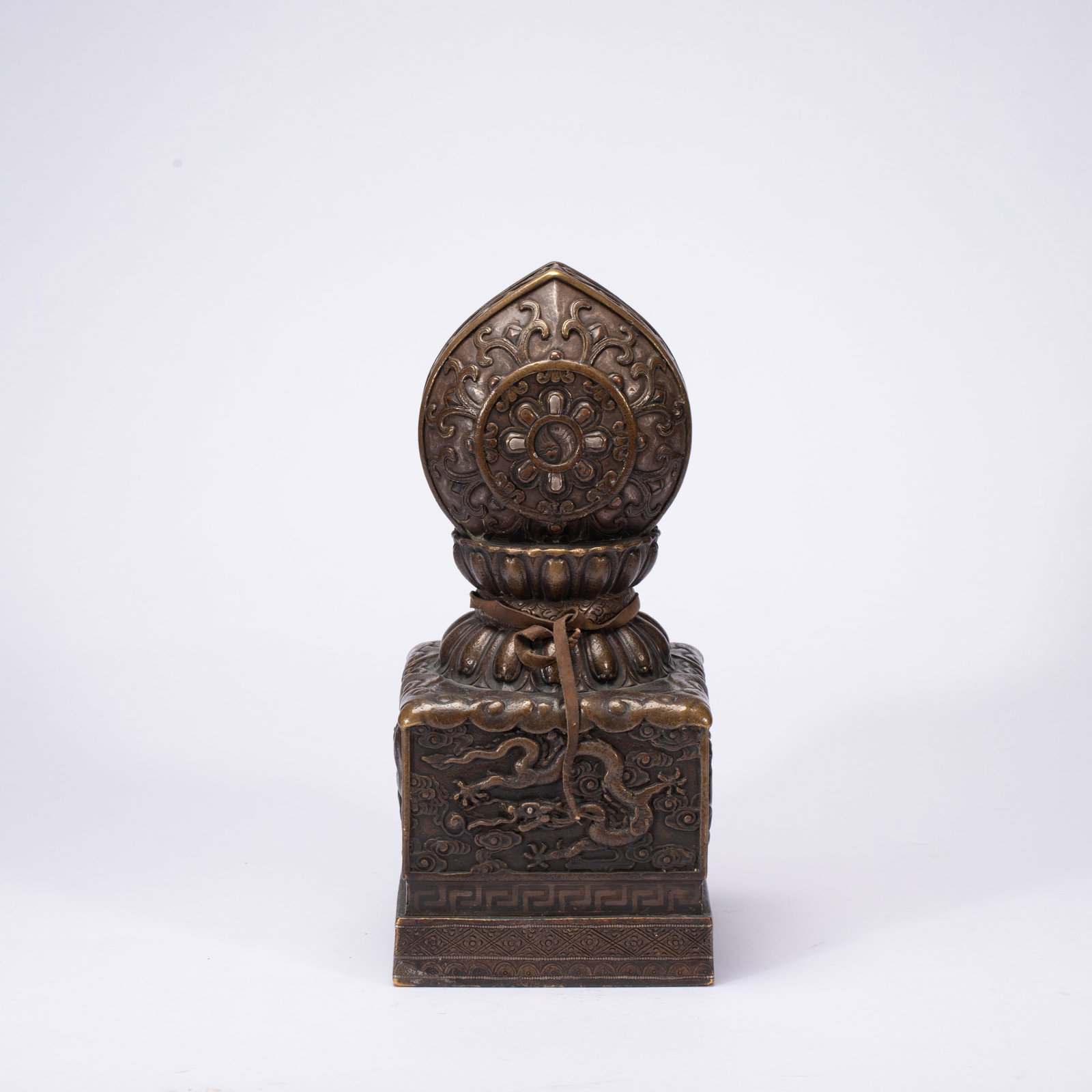 An Exquisite Bronze Auspicious Cloud and Dragon Pattern Seal: An Exquisite Bronze Auspicious Cloud and Dragon Pattern Seal,Qing Dynasty,China,Size:4.7inx4.7inx9.8in,Weight:3220g 铜祥云龙纹印章,中国清