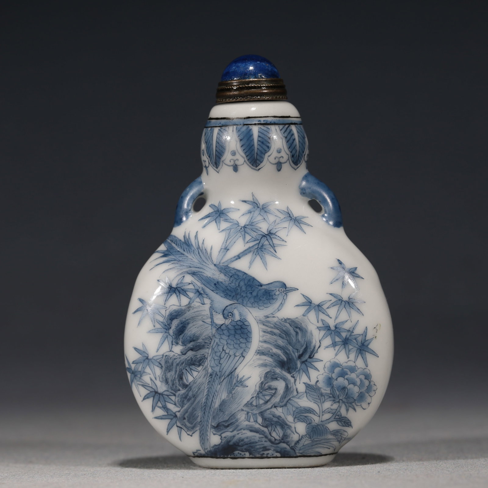 An Exquisite Blue and White Golden Pheasant Peony Bamboo Rock Pattern Double-handled Gourd-shaped: An Exquisite Blue and White Golden Pheasant Peony Bamboo Rock Pattern Double-handled Gourd-shaped Snuff Bottle,Qing Dynasty, China,Qianlong Four-character Mark,Size:2in×1in×3.1in