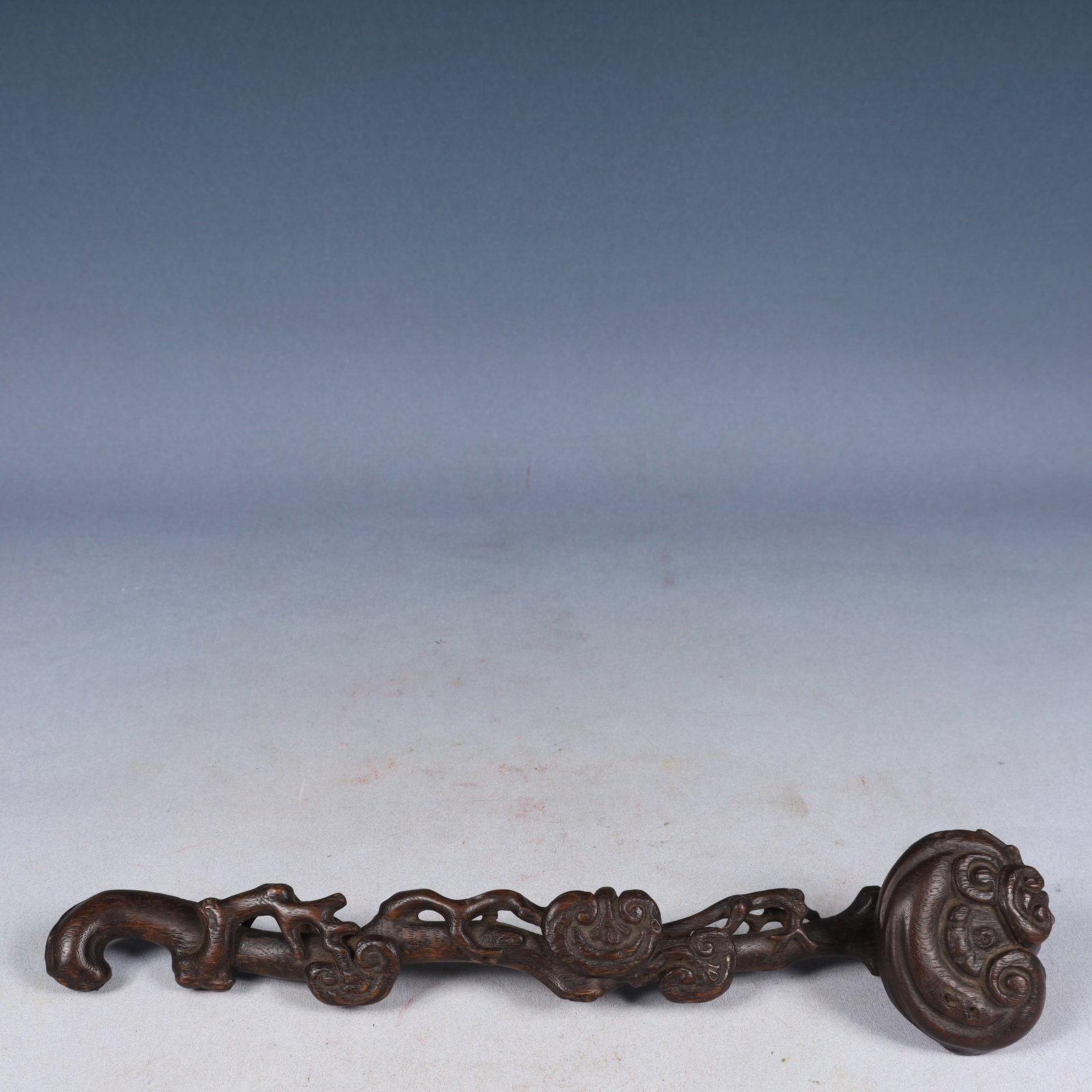 A Rare Zitanwood Ganoderma lucidum-Shaped Ruyi: A Rare Zitanwood Ganoderma lucidum-Shaped Ruyi,Qing Dynasty, China,Size:13.4inx2.8inx2in,Weight:50g 紫檀木灵芝形如意,中国清代