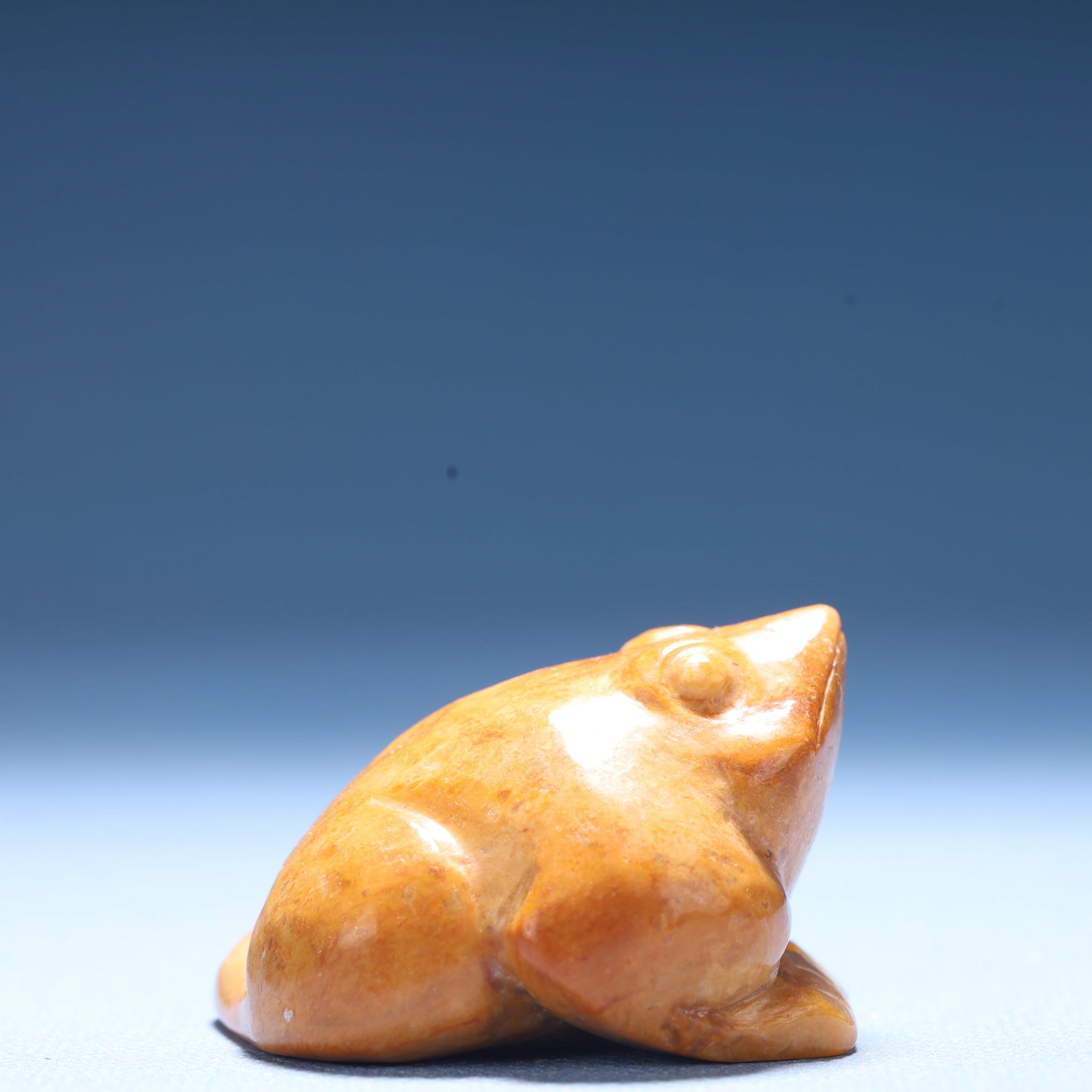 An Archaic Hongshan Culture Yellow Jade Frog Ornament: An Archaic Hongshan Culture Yellow Jade Frog Ornament,Ancient Time,China,Size:1.9inx1.7inx1.2in,Weight:78.6g 红山文化黄玉青蛙摆件,中&#