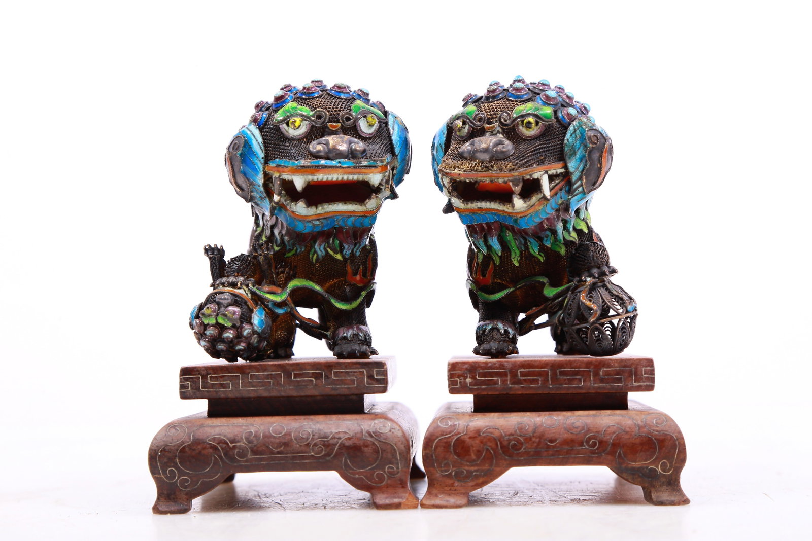 A Pair of Silver Burnt blue 'Lion' Ornaments: A Pair of Silver Burnt blue 'Lion' Ornaments. Chinese Qing Dynasty. Size:3.3inx2.2inx3.7in. Weight:550g.