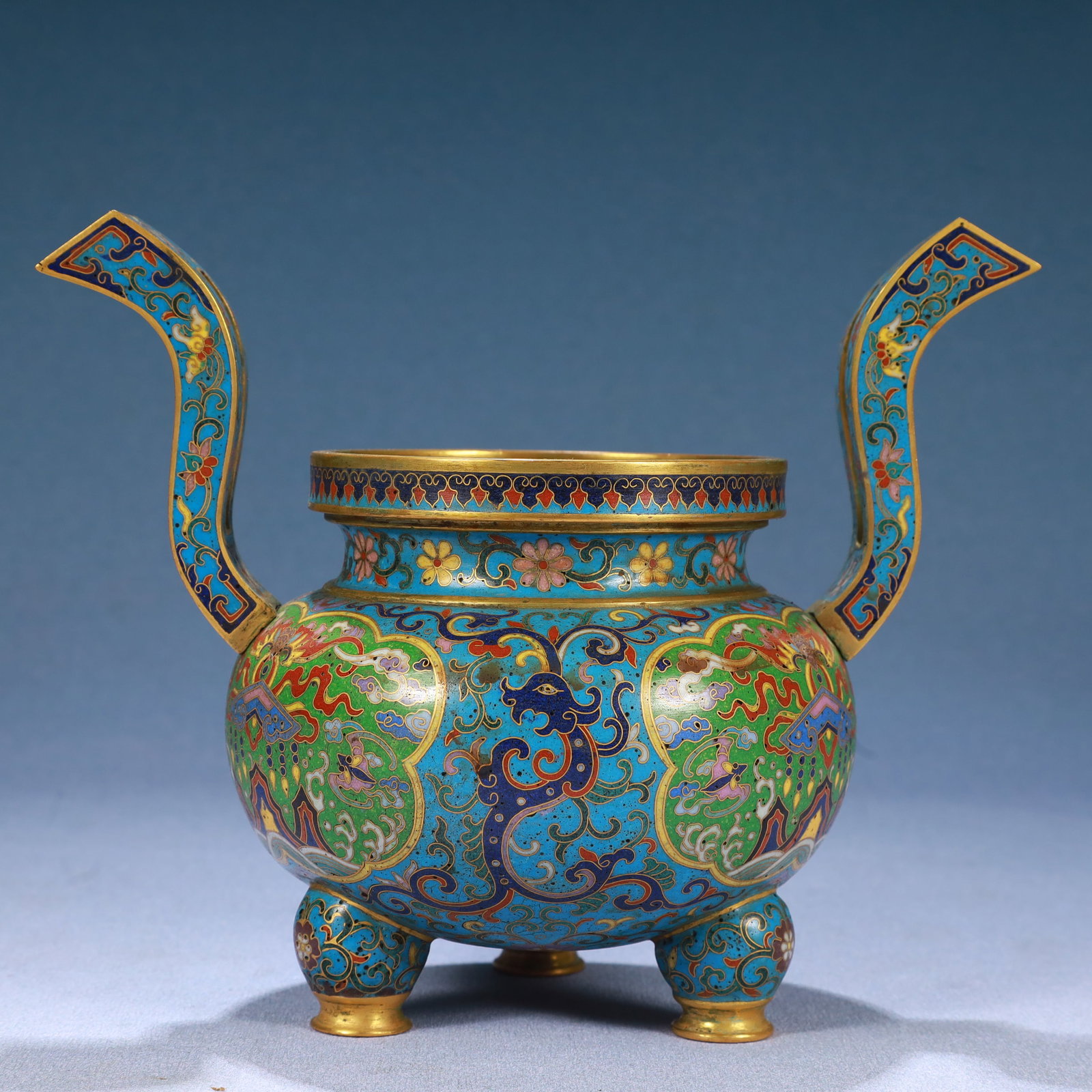 An Exquisite Cloisonne Lotus and Bats Pattern Double-Ears and Tripod Censer: An Exquisite Cloisonne Lotus and Bats Pattern Double-Ears and Tripod Censer,Qing Dynasty, China,Qianlong Four-character Mark,Size:8inx5.1inx6.3in,Weight:850g 景泰蓝缠枝&#