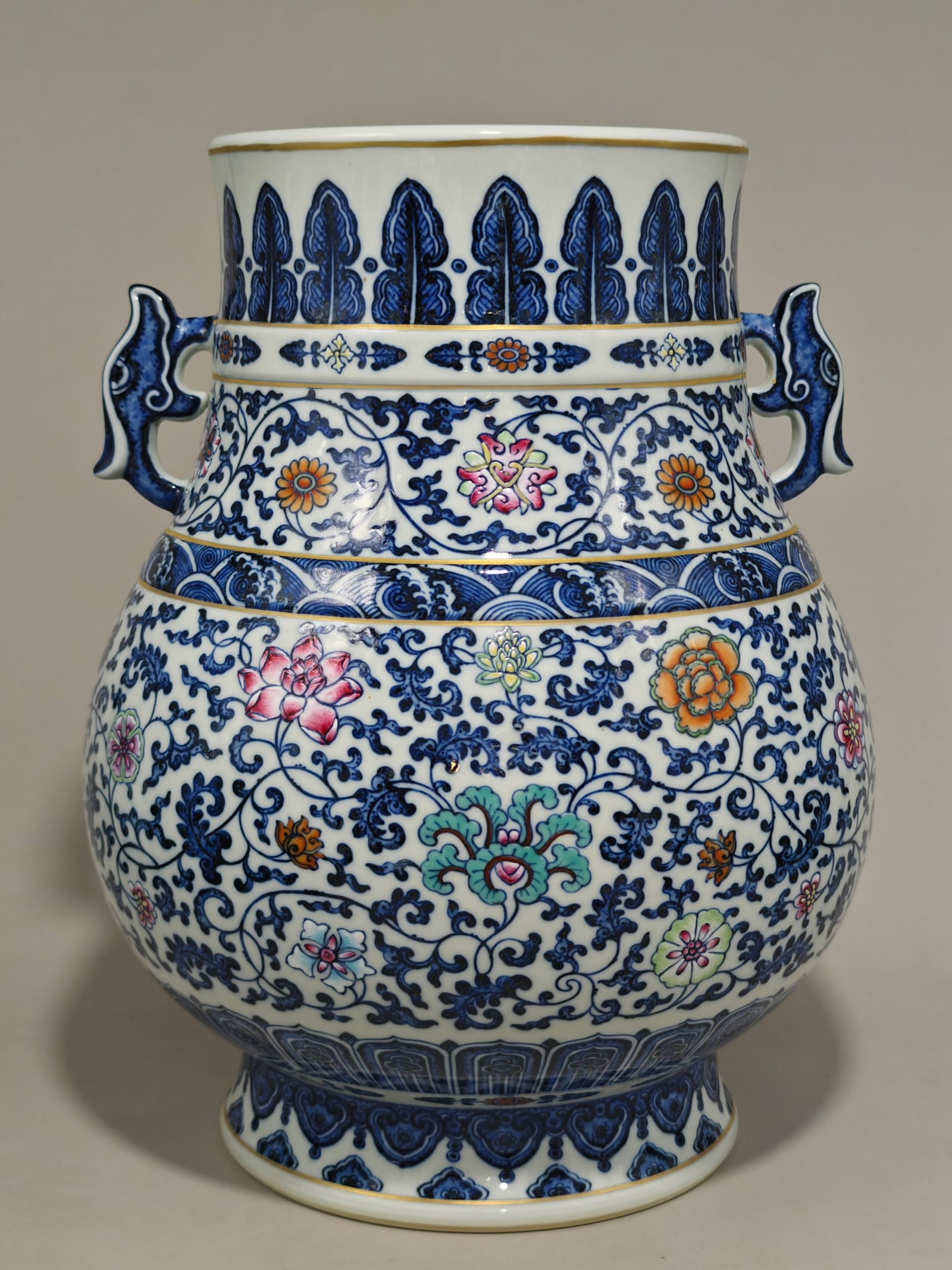 A Rare Blue and White Doucai Lotus Pattern Double-Ears Vase: A Rare Blue and White Doucai Lotus Pattern Double-Ears Vase,Qing Dynasty,China,Qianlong Six-character Mark,Size:15inx11.8in 青花斗彩缠枝莲纹双 