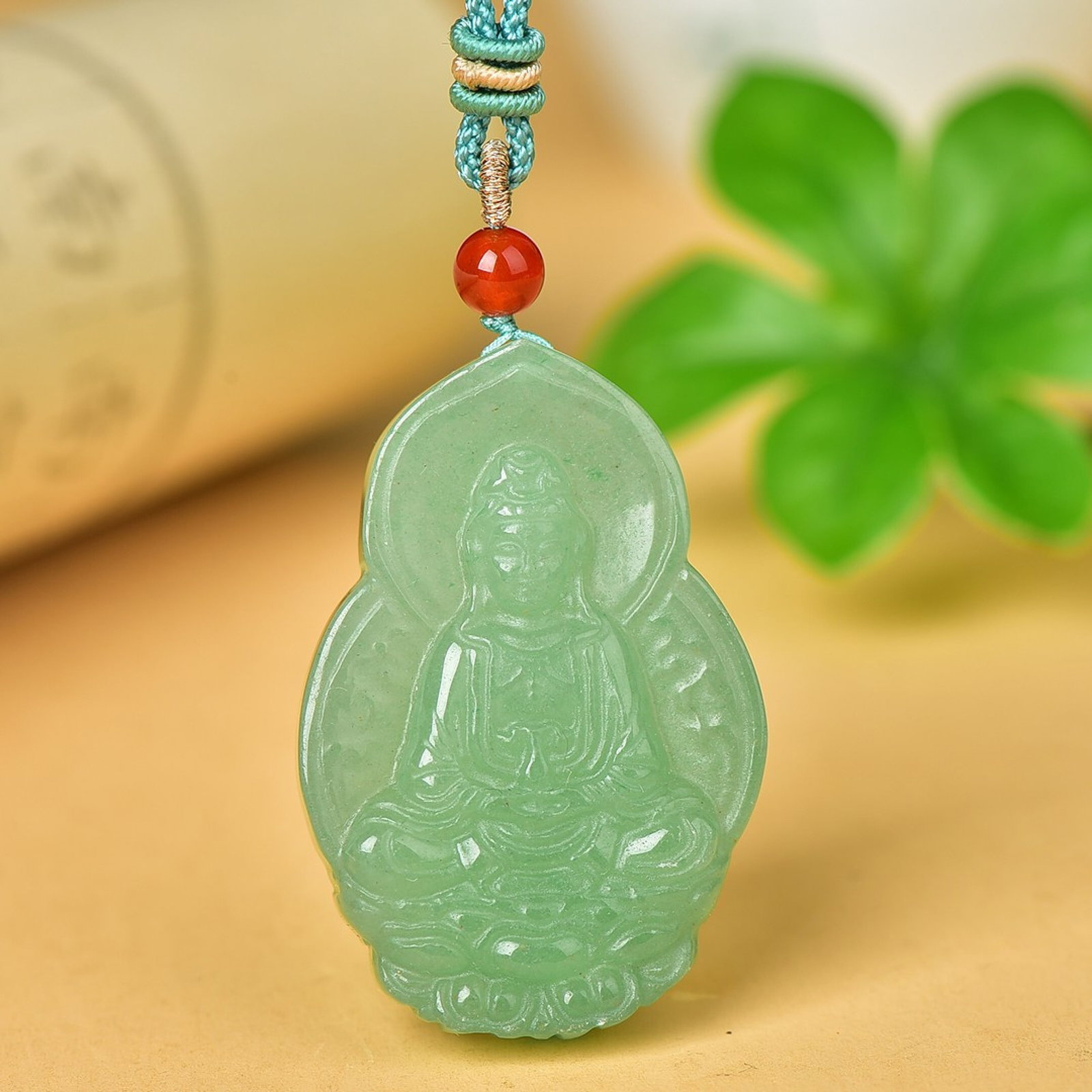An Exquisite Greenish Jade Statue of Avalokitesvara Pendant: An Exquisite Greenish Jade Statue of Avalokitesvara Pendant,Size:32mmx48mm 青玉观音挂件