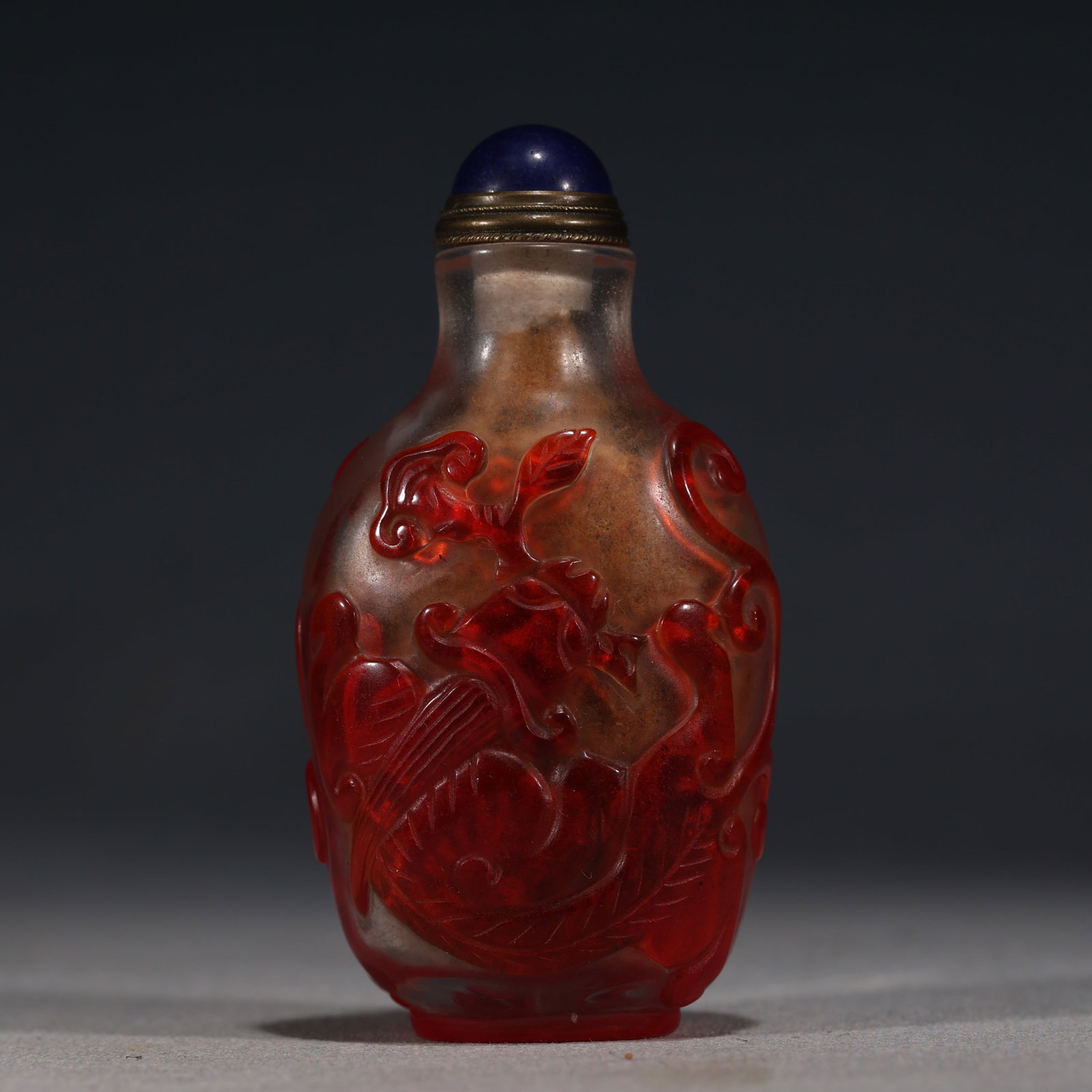 An Exquisite Overlaid Red Glass Snuff Bottle With Dragon Pattern (1 of 5)