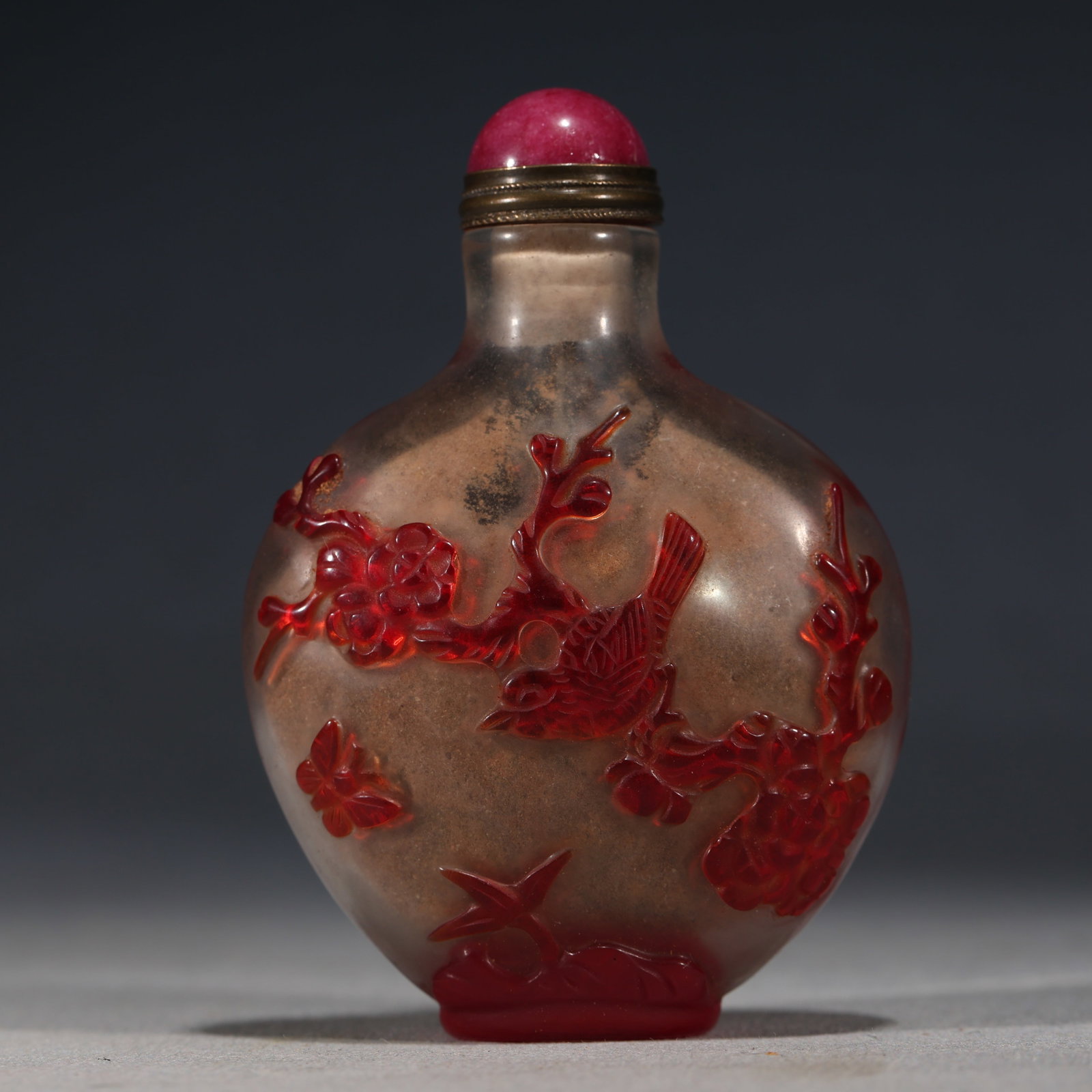 An Exquisite Overlaid Red Glass Snuff Bottle With Flower And Bird Pattern: An Exquisite Overlaid Red Glass Snuff Bottle With Flower And Bird Pattern,China,Qing Dynasty,Four-Character Daoguang Mark,Dimensions:3.1inx2.4in,套红琉璃花鸟纹