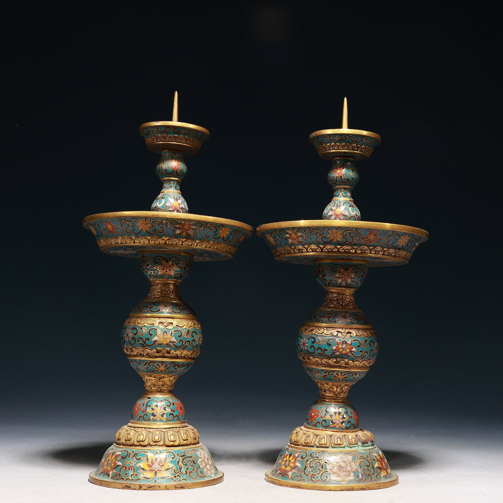 A Pair of Rare Cloisonne Lotus Pattern Candlesticks: A Pair of Rare Cloisonne Lotus Pattern Candlesticks,Qing Dynasty,China,Qianlong Four-character Mark,Size:5.1inx12.2in,Weight:2100g 一对景泰蓝缠枝莲ń