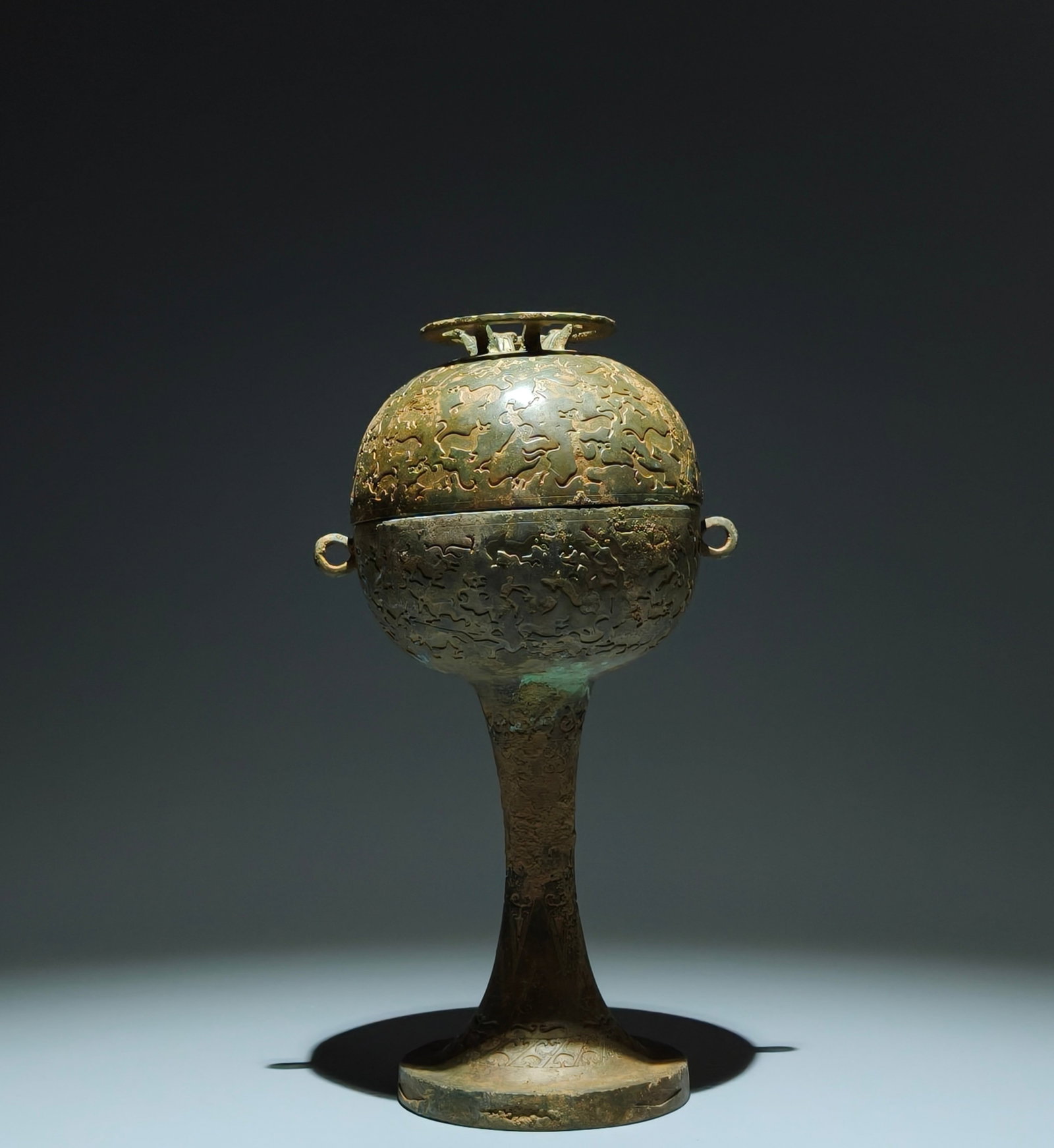 An Archaic Bronze Auspicious Beast Pattern Double-Ears Food Vessel: An Archaic Bronze Auspicious Beast Pattern Double-Ears Food Vessel,the Warring States period in China,Size:12.2inx6.7inx6.7in 青铜瑞兽纹双耳食器,&