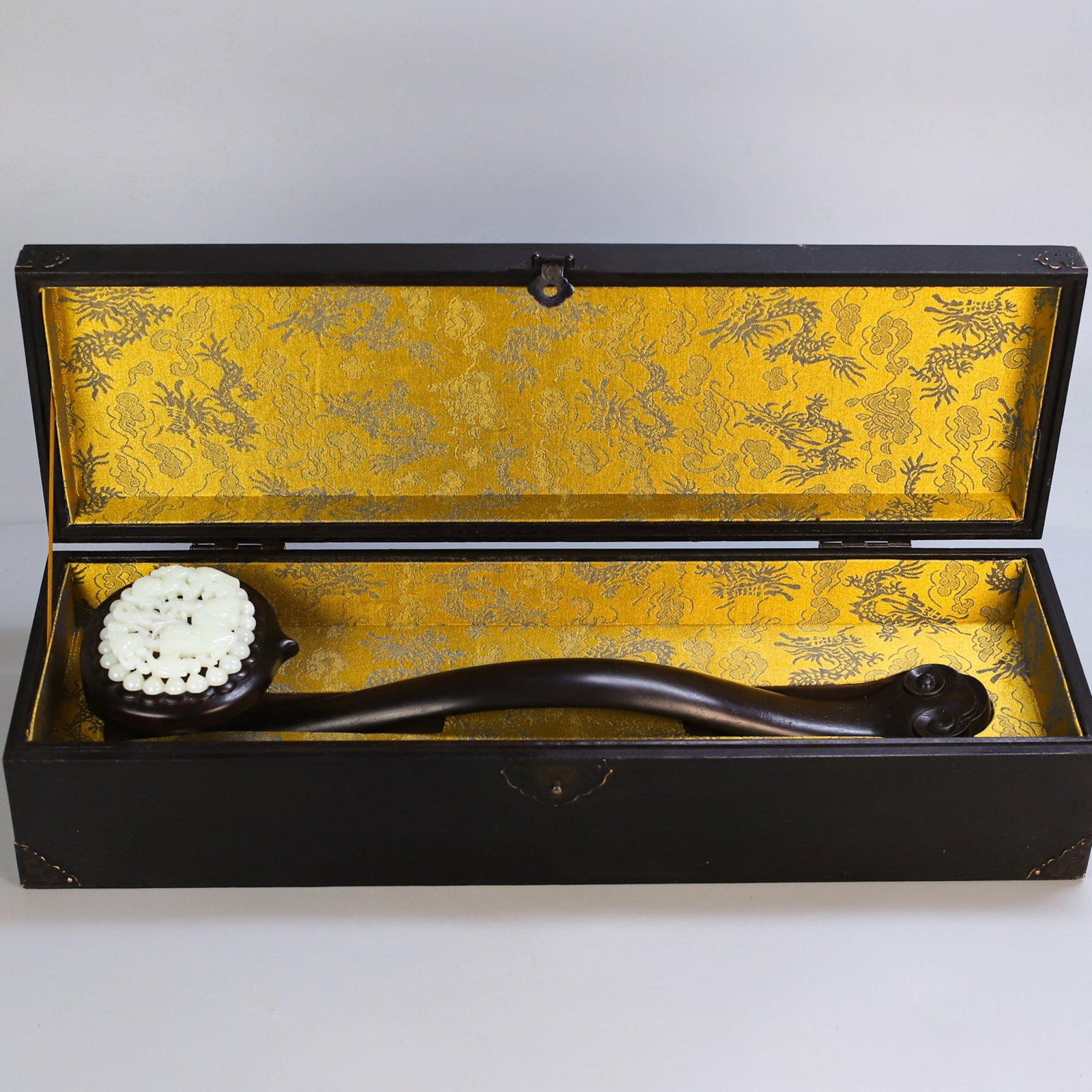 A Huge Zitanwood Inlaid White Jade Hollow Auspicious Beast Pattern Ruyi: A Huge Zitanwood Inlaid White Jade Hollow Auspicious Beast Pattern Ruyi,Qing Dynasty,China,Size:(Box)5.1inx21.3in,(Ruyi)18.5inx4.7in,Total Weight:2600g