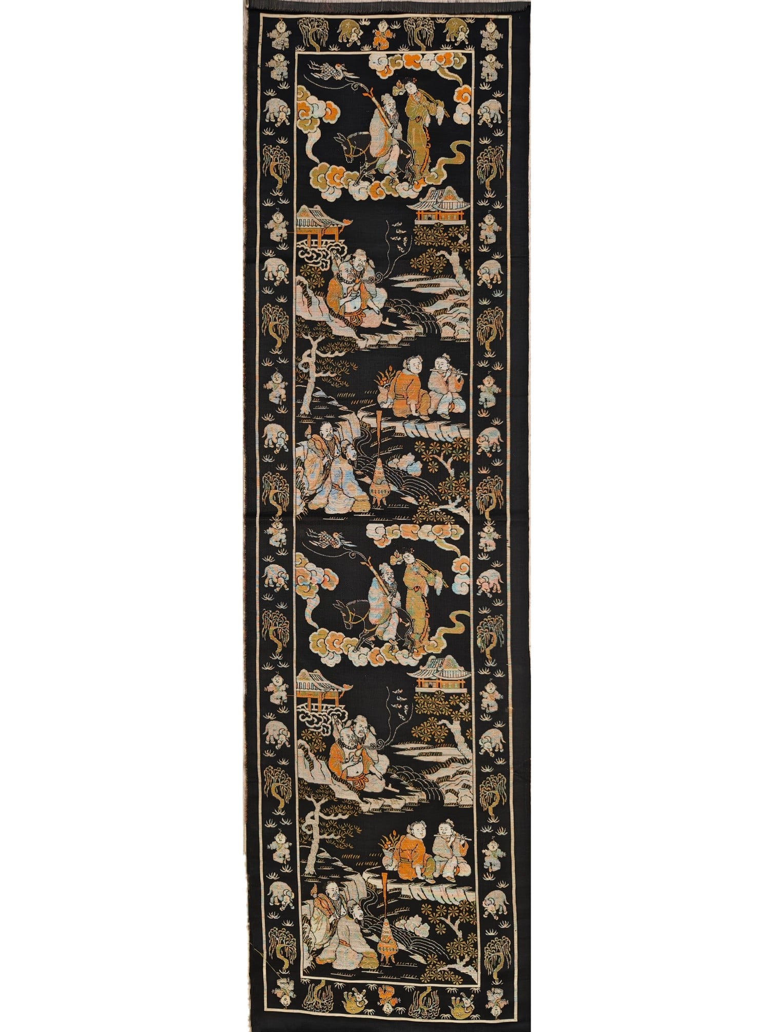 Figures of Brocade Immortals: Qing Dynasty Brocade Group of Immortal Figures. It presents the image of a group of immortals, usually including various gods, nymphs, and Taoist priests, who represent the longing for longevity,
