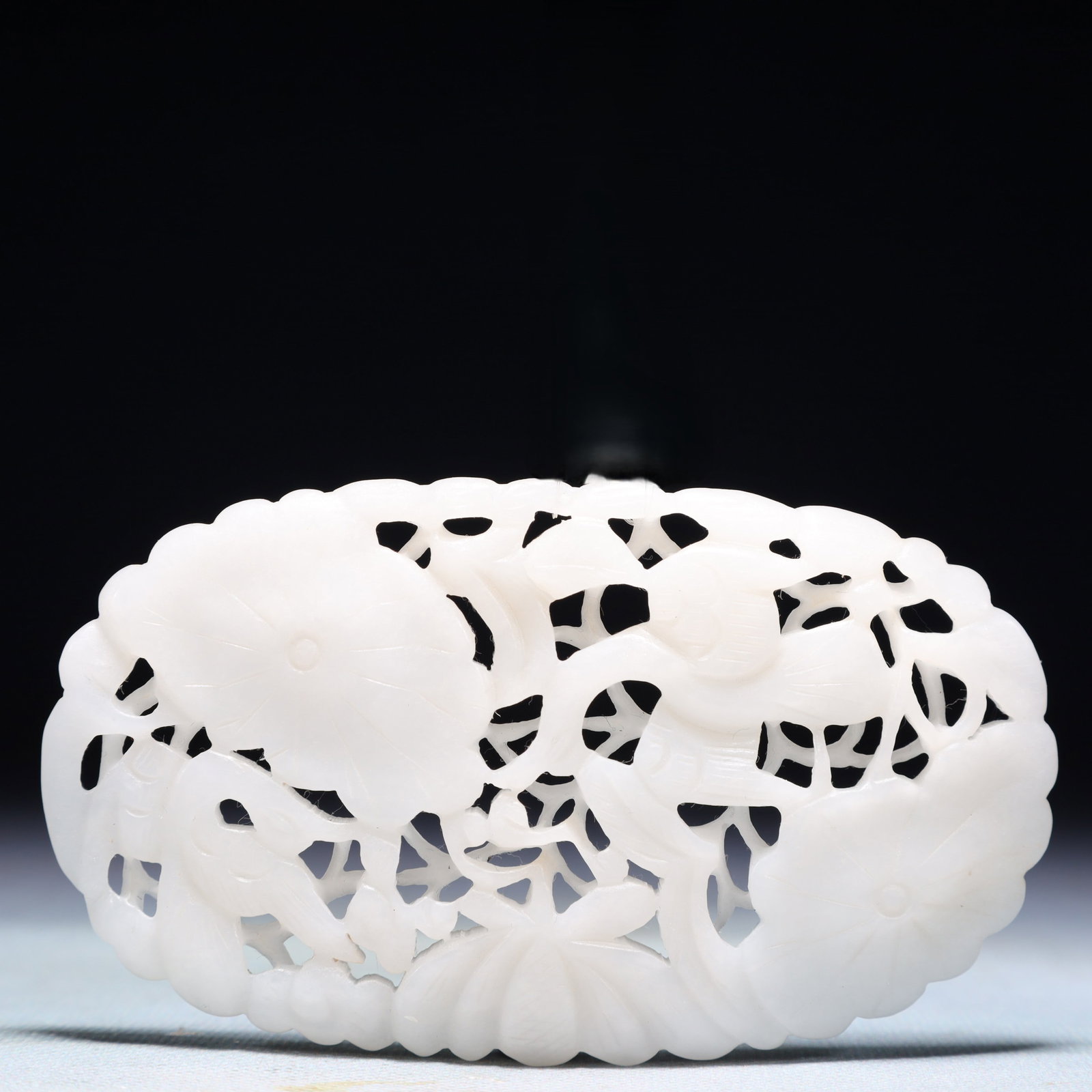 An Exquisite White Jade Flower and Bird Pattern Pendant: An Exquisite White Jade Flower and Bird Pattern Pendant,Qing Dynasty,China,Size:4.3inx2.6in,Weight:94.6g 白玉花鸟纹佩,中国清代