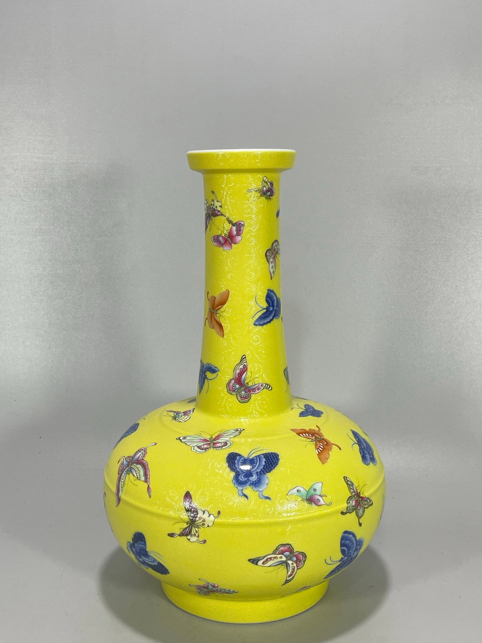 A Rare Yellow Ground Famille-Rose Butterfly Pattern Vase: A Rare Yellow Ground Famille-Rose Butterfly Pattern Vase,Qing Dynasty,China,Qianlong Six-character Mark,Size:12.7inx8.3in