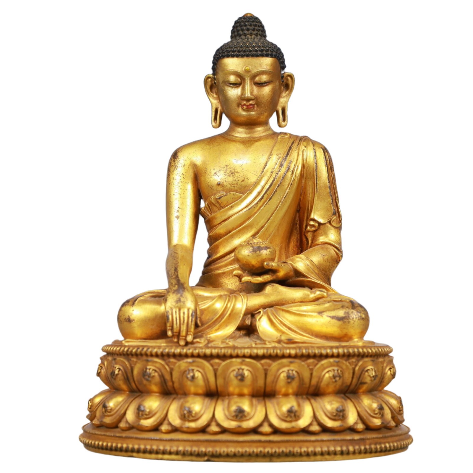 A Solemn Gilt Bronze Statue of Sakyamuni: A Solemn Gilt Bronze Statue of Sakyamuni, Ming Dynasty, China, Yongle Six-character Mark, Size:5.5inx5.1inx7.5in, Weight:1650g