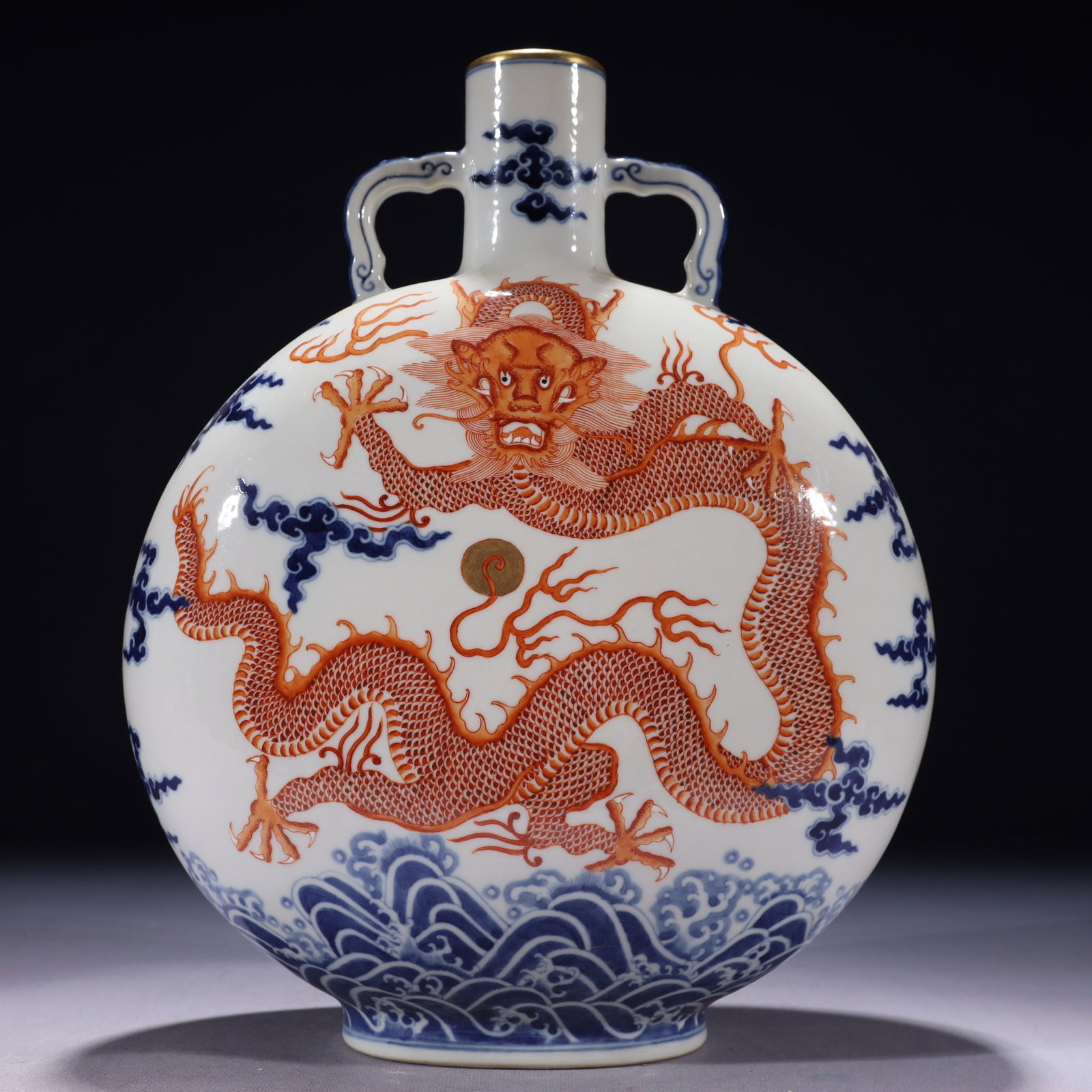 An Exquisite Blue and White Iron-Red Painted Gold Auspicious Cloud and Dragon Pattern Double-Ears: An Exquisite Blue and White Iron-Red Painted Gold Auspicious Cloud and Dragon Pattern Double-Ears Vase,Qing Dynasty,China,Qianlong Six-character Mark,Size:9.8inx4.3inx13in,Weight:3400g