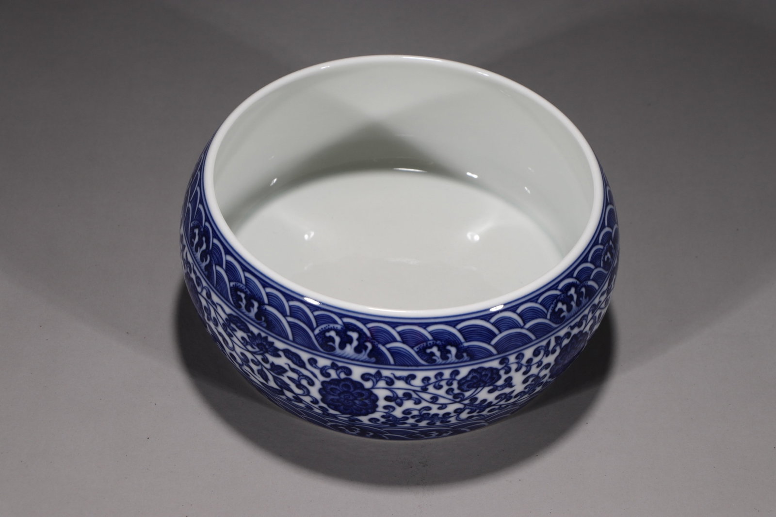 An Exquisite Blue and White Lotus Pattern Water Pot: An Exquisite Blue and White Lotus Pattern Water Pot,Qing Dynasty,China,Yongzheng Six-character Mark,Size:3inx6in
