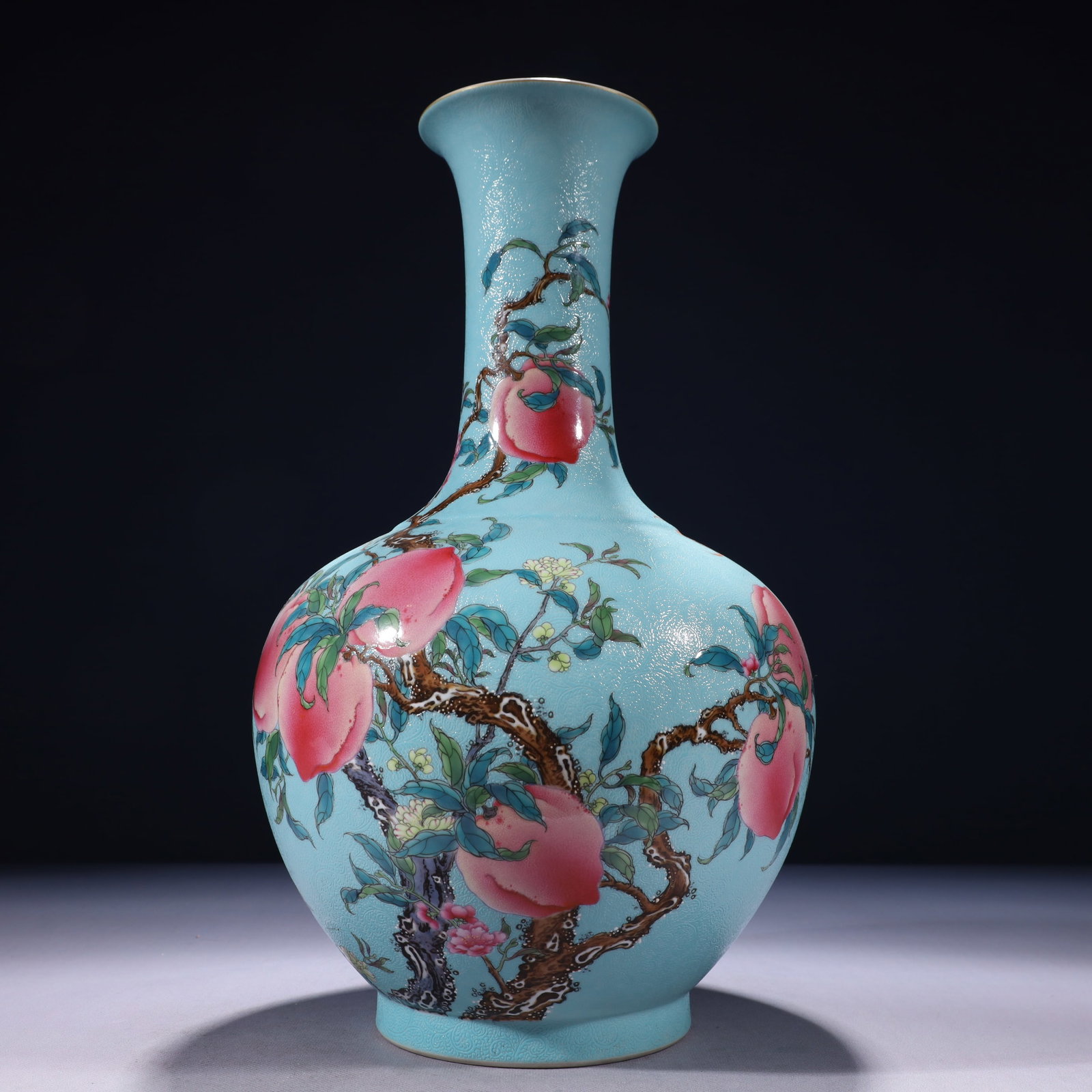 An Exquisite Turquoise Glazed Famille-Rose Painted Gold Bats and Peach Pattern Vase: An Exquisite Turquoise Glazed Famille-Rose Painted Gold Bats and Peach Pattern Vase,Qing Dynasty,China,Qianlong Six-character Mark,Size:9.1inx16.5in,Weight:3350g 松石绿釉౴