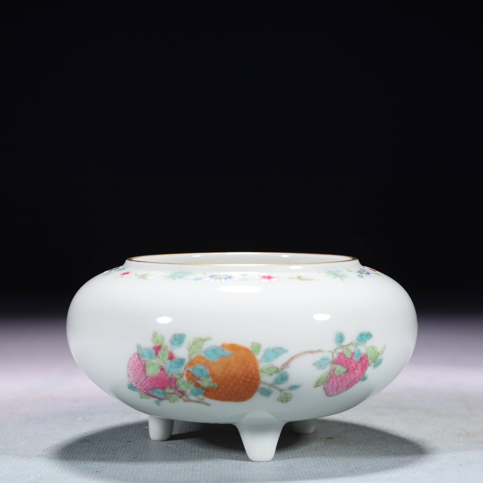 An Exquisite Famille-Rose Painted Gold Flower and Fruit Pattern Tripod Censer: An Exquisite Famille-Rose Painted Gold Flower and Fruit Pattern Tripod Censer,Qing Dynasty,China,Qianlong Six-character Mark,Size:3.9inx2in,Weight:480g 粉彩描金花果
