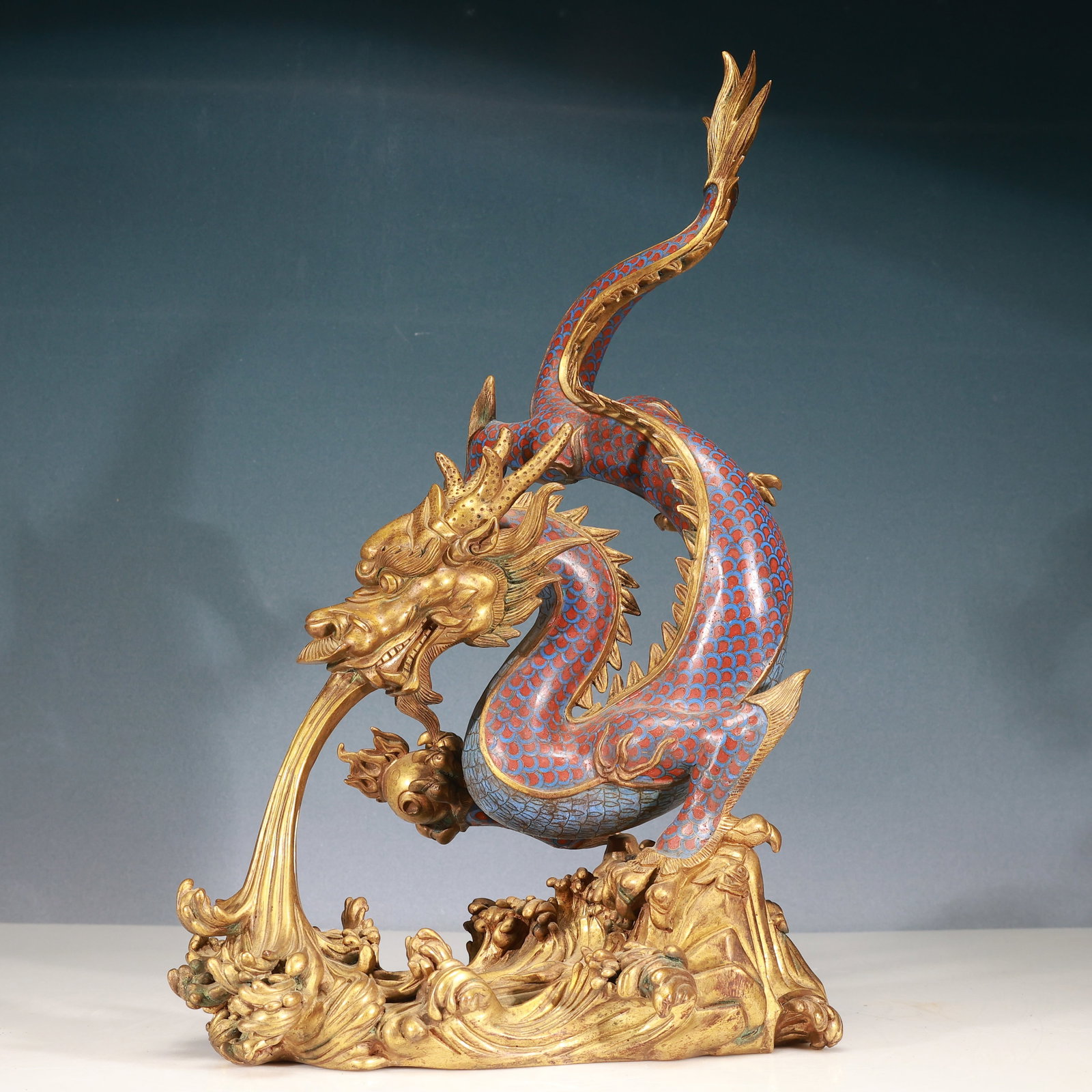 A Huge Cloisonne Seawater Pattern Dragon Ornament: A Huge Cloisonne Seawater Pattern Dragon Ornament,Qing Dynasty, China,Qianlong Four-character Mark,Size:11.8inx7.5inx20.9in,Weight:9800g 景泰蓝海水纹龙摆