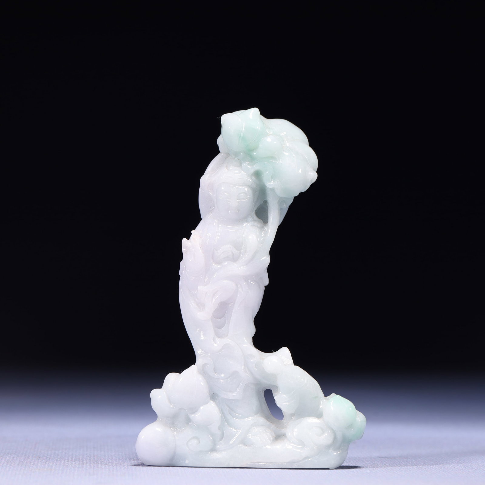 An Exquisite Jadeite Statue of Avalokitesvara: An Exquisite Jadeite Statue of Avalokitesvara,Qing Dynasty,China,Size:2.6inx0.4inx4.3in,Weight:125g 翡翠观音像,中国清代