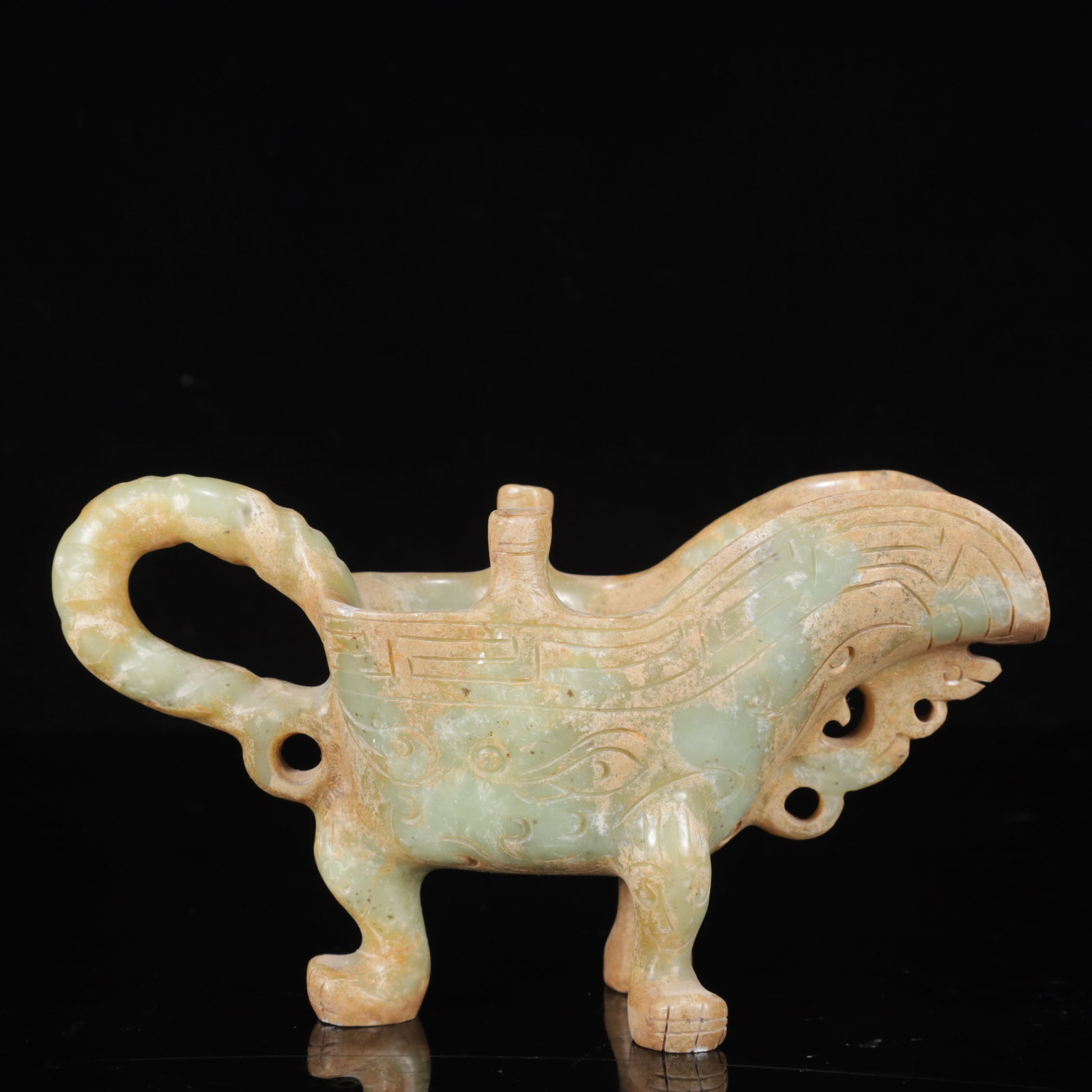An Exquisite White Jade Beast-Face Pattern Tripod Cup: An Exquisite White Jade Beast-Face Pattern Tripod Cup,Qing Dynasty,China,Size:7.9inx2.8inx4.3in,Weight:683g