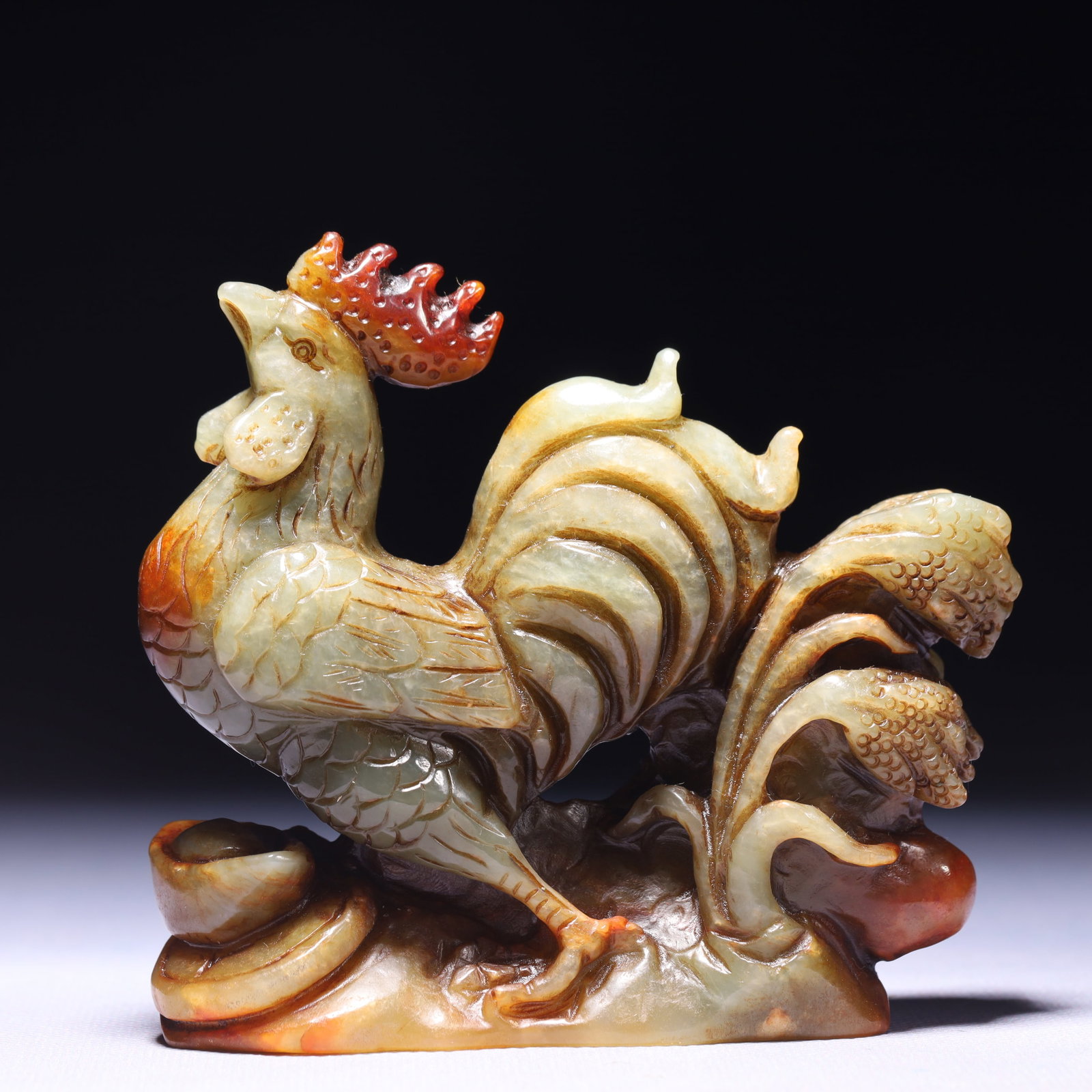 An Exquisite Green Jade Rooster Ornament: An Exquisite Green Jade Rooster Ornament,Qing Dynasty,China,Size:4.3inx1.6inx3.7in,Weight:492g 青玉公鸡摆件,中国清代