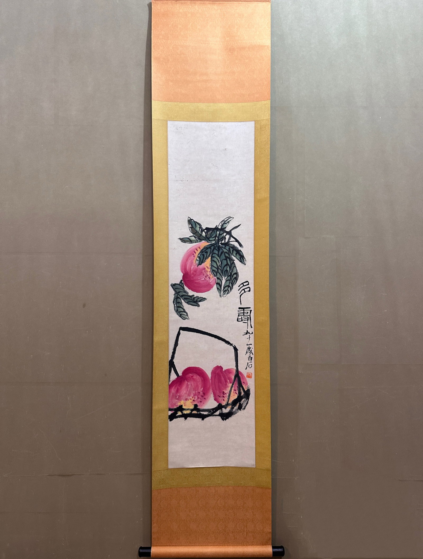 A Chinese Vertical Scroll Ink Painting of Shou and Peach on Paper: A Chinese Vertical Scroll Ink Painting of Shou and Peach on Paper,Qi Baishi,Size:13.4inx53.1in 一幅中国水墨寿桃画立轴,齐白