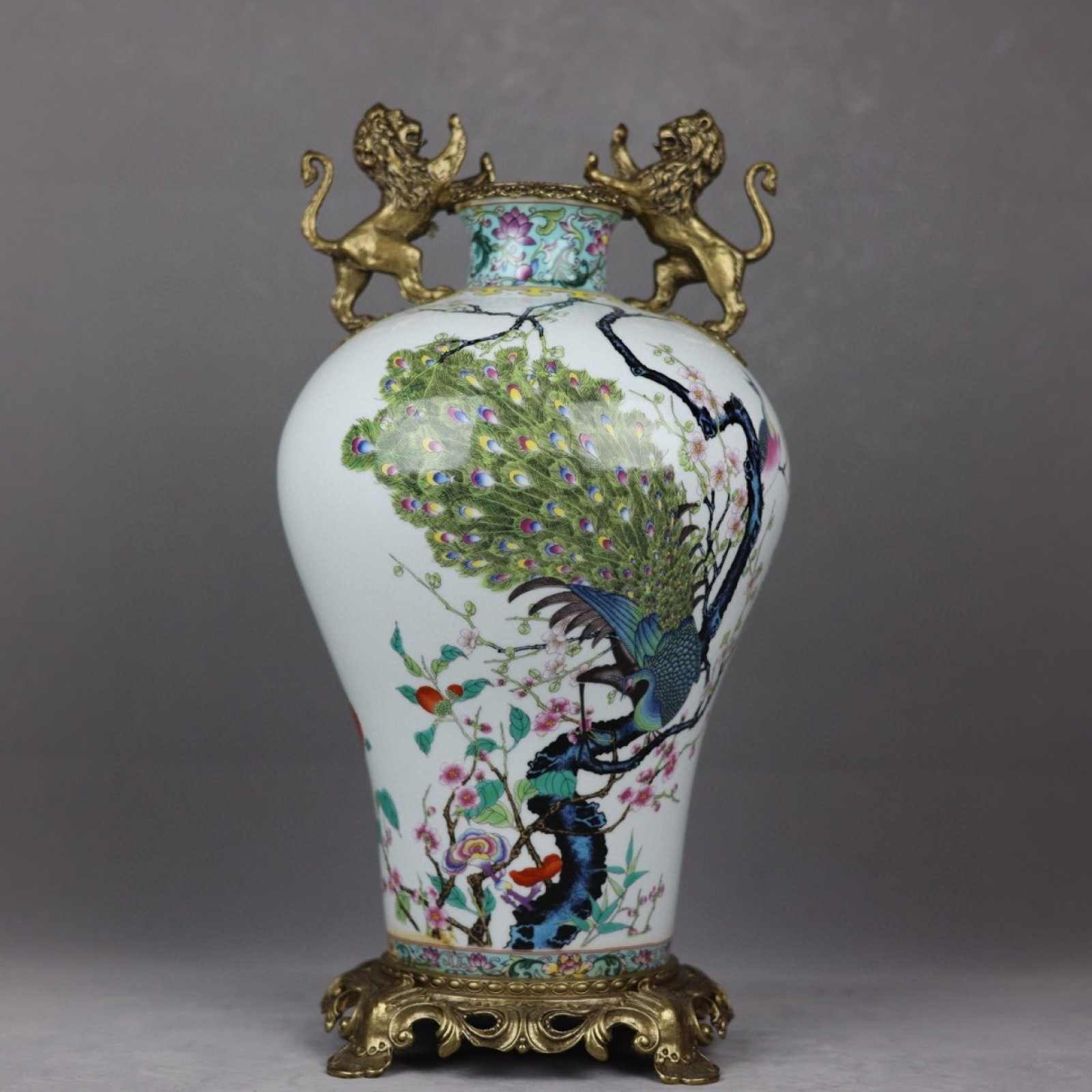 A Huge Famille-Rose Inlaid Bronze Flower and Peacock Pattern Lion-Ears Vase,with poem: A Huge Famille-Rose Inlaid Bronze Flower and Peacock Pattern Lion-Ears Vase,with poem,Qing Dynasty,China,Qianlong Four-character Mark,Size:18.1inx9.1in 粉彩镶铜花卉
