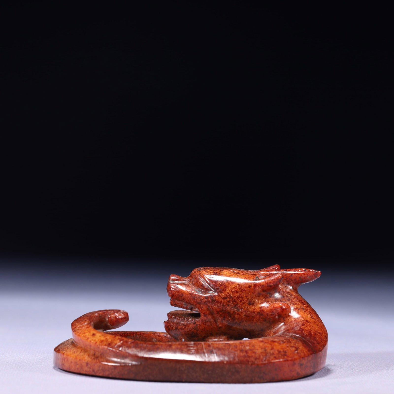 An Exquisite Archaic Jade Dragon Ornament: An Exquisite Archaic Jade Dragon Ornament,Ancient Time,China,Size:4.1inx3.3inx1.2in,Weight:262g 高古玉龙摆件,中国远古时期