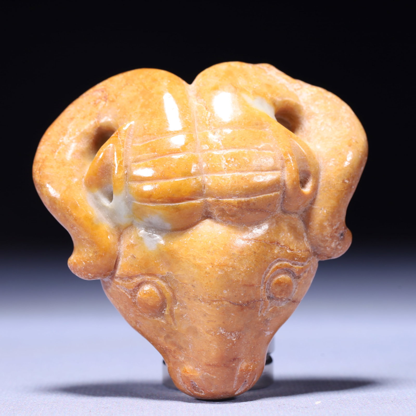 An Archaic Hongshan Culture Yellow Jade Sheep Head Ornament: An Archaic Hongshan Culture Yellow Jade Sheep Head Ornament,Ancient Time,China,Size:3inx2.8inx0.8in,Weight:146g