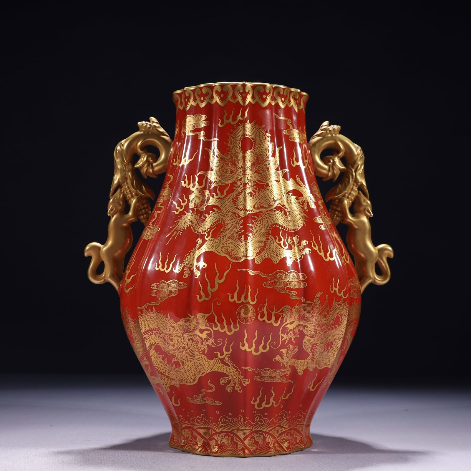 An Exquisite Iron-Red Painted Gold Auspicious Cloud and Dragon Pattern Double-Ears Vase,with an: An Exquisite Iron-Red Painted Gold Auspicious Cloud and Dragon Pattern Double-Ears Vase,with an Imperial Poem by Emperor Qianlong,Qing Dynasty,China,Size:9.4inx7.1inx11.4in,Weight:1750g 矾಩