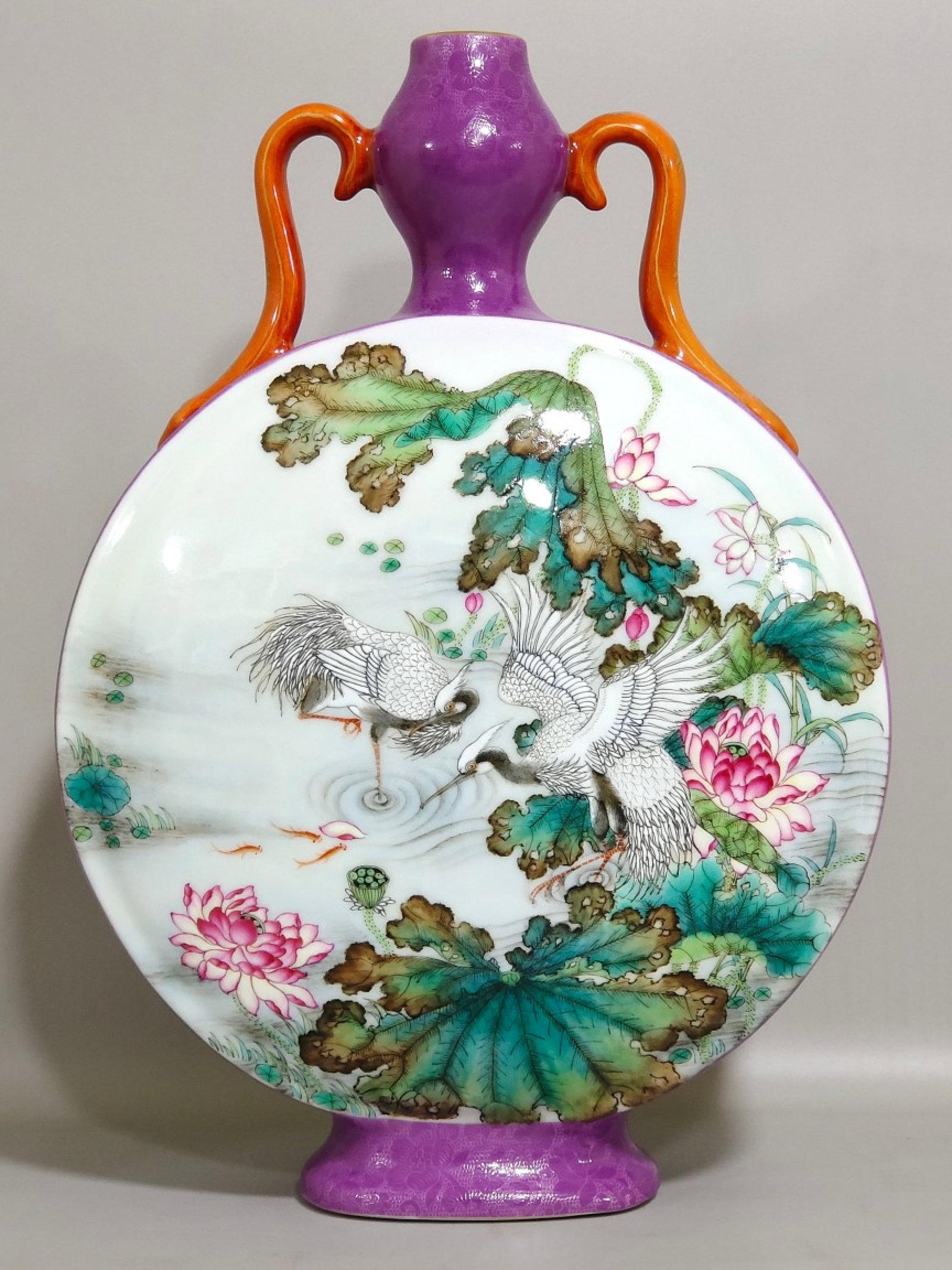A Rare Purple Glazed Famille-Rose Painted Gold Flower and Crane Pattern Double-Ears Vase: A Rare Purple Glazed Famille-Rose Painted Gold Flower and Crane Pattern Double-Ears Vase,Qing Dynasty,China,Qianlong Six-character Mark,Size:13.4inx8.7in 紫釉粉彩描ດ