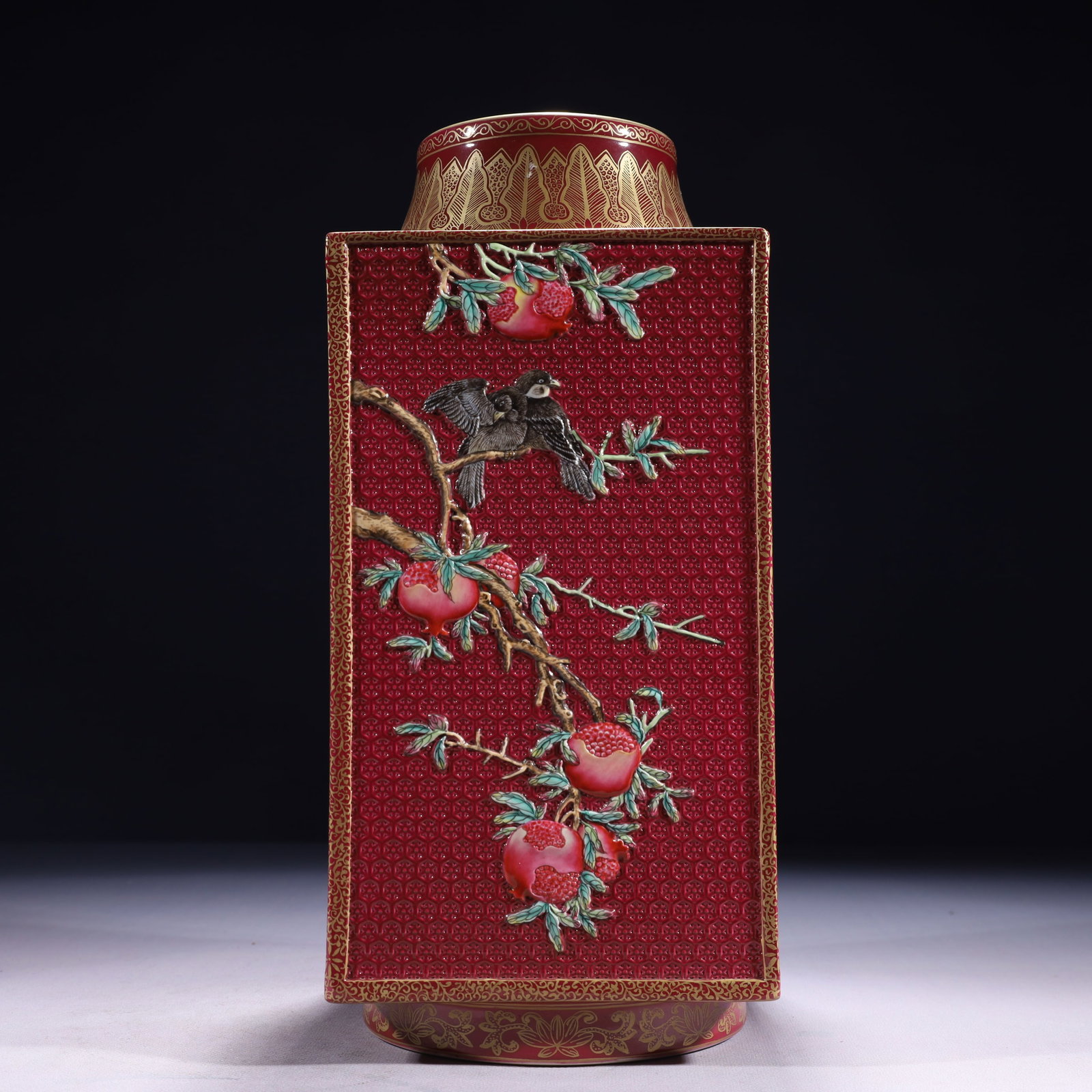 An Exquisite Red Ground Famille-Rose Painted Gold Flower and Bird Pattern Vase: An Exquisite Red Ground Famille-Rose Painted Gold Flower and Bird Pattern Vase,Qing Dynasty,China,Qianlong Six-character Mark,Size:5.5inx12.8in,Weight:3500g 红地粉彩描