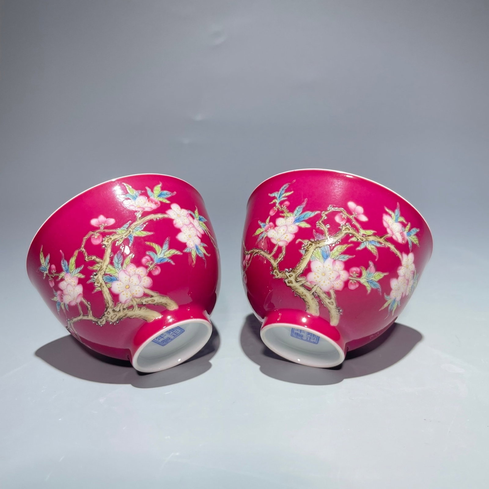 A Pair of Exquisite Ruby Red-Glazed Famille-Rose Flower Pattern Cups: A Pair of Exquisite Ruby Red-Glazed Famille-Rose Flower Pattern Cups,Qing Dynasty,China,Yongzheng Four-character Mark,Size:2.1inx3in 一对胭脂红粉彩花