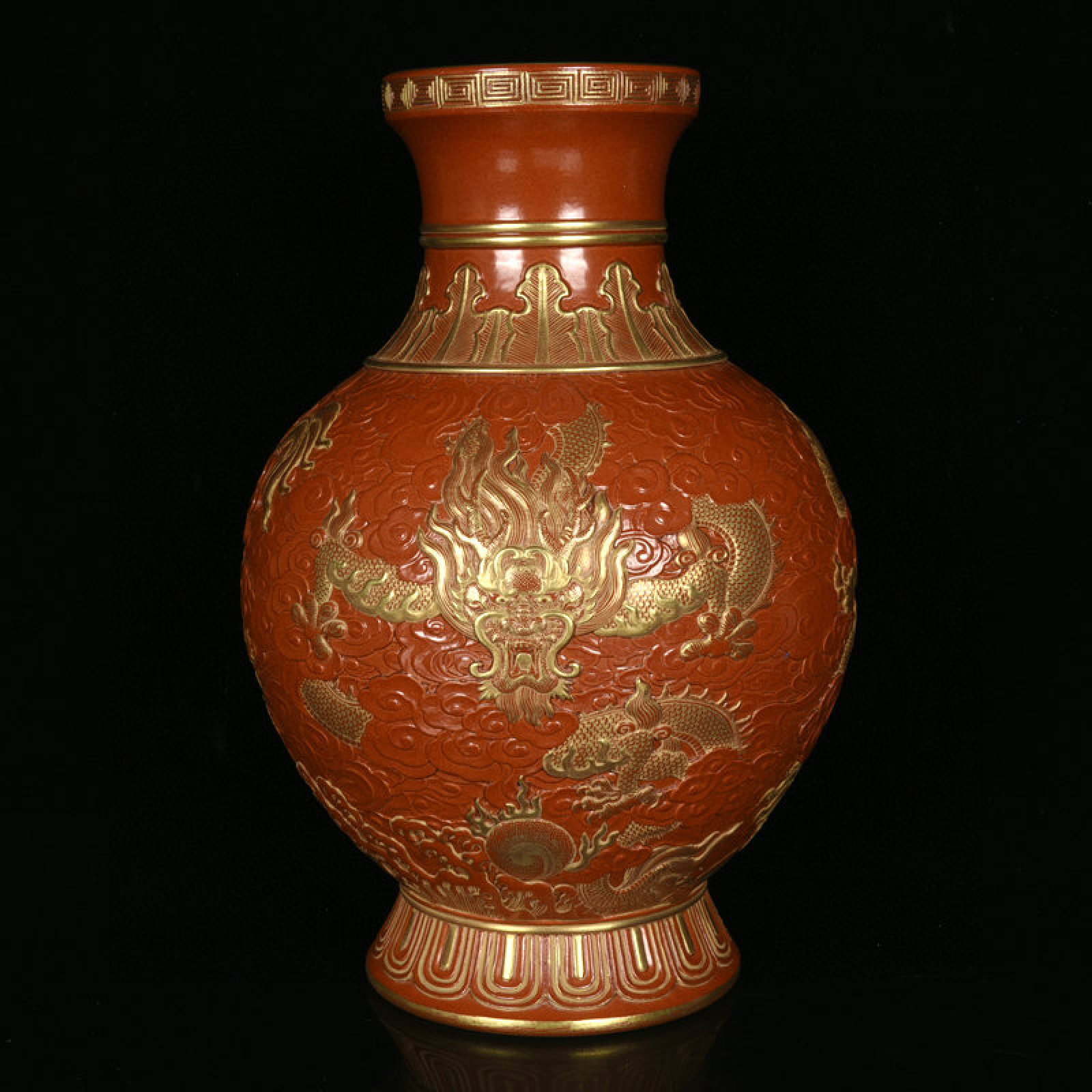 An Exquisite Red Glazed Painted Gold Auspicious Cloud and Dragon Pattern Vase: An Exquisite Red Glazed Painted Gold Auspicious Cloud and Dragon Pattern Vase,Qing Dynasty,China,Qianlong Six-character Mark,Size:11inx7.9in 红釉描金祥云龙