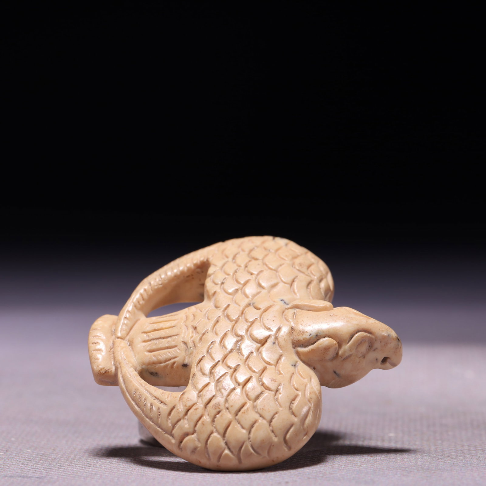 An Archaic Hongshan Culture Yellow Jade Phoenix Ornament: An Archaic Hongshan Culture Yellow Jade Phoenix Ornament,Ancient Time,China,Size:2inx2.2inx0.4in,Weight:32g 红山文化黄玉凤摆件,中国