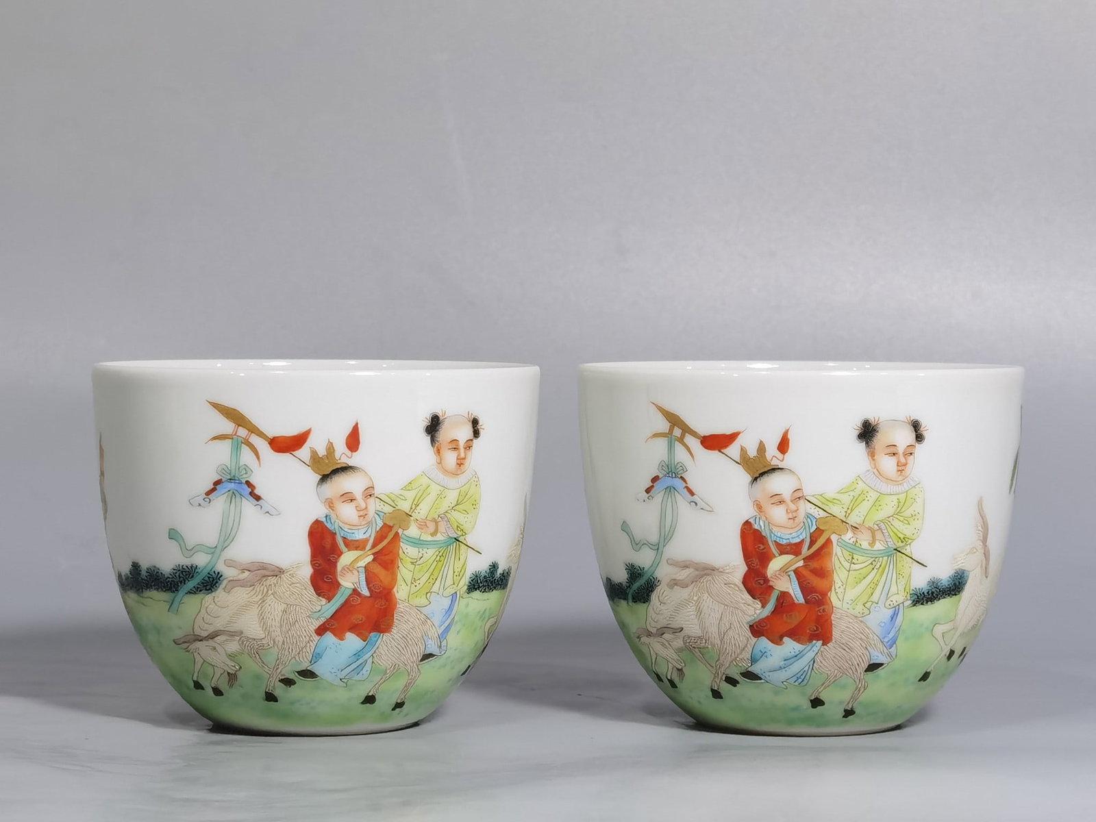 A Pair of Exquisite Famille-Rose Character and Story Pattern Cups (1 of 9)