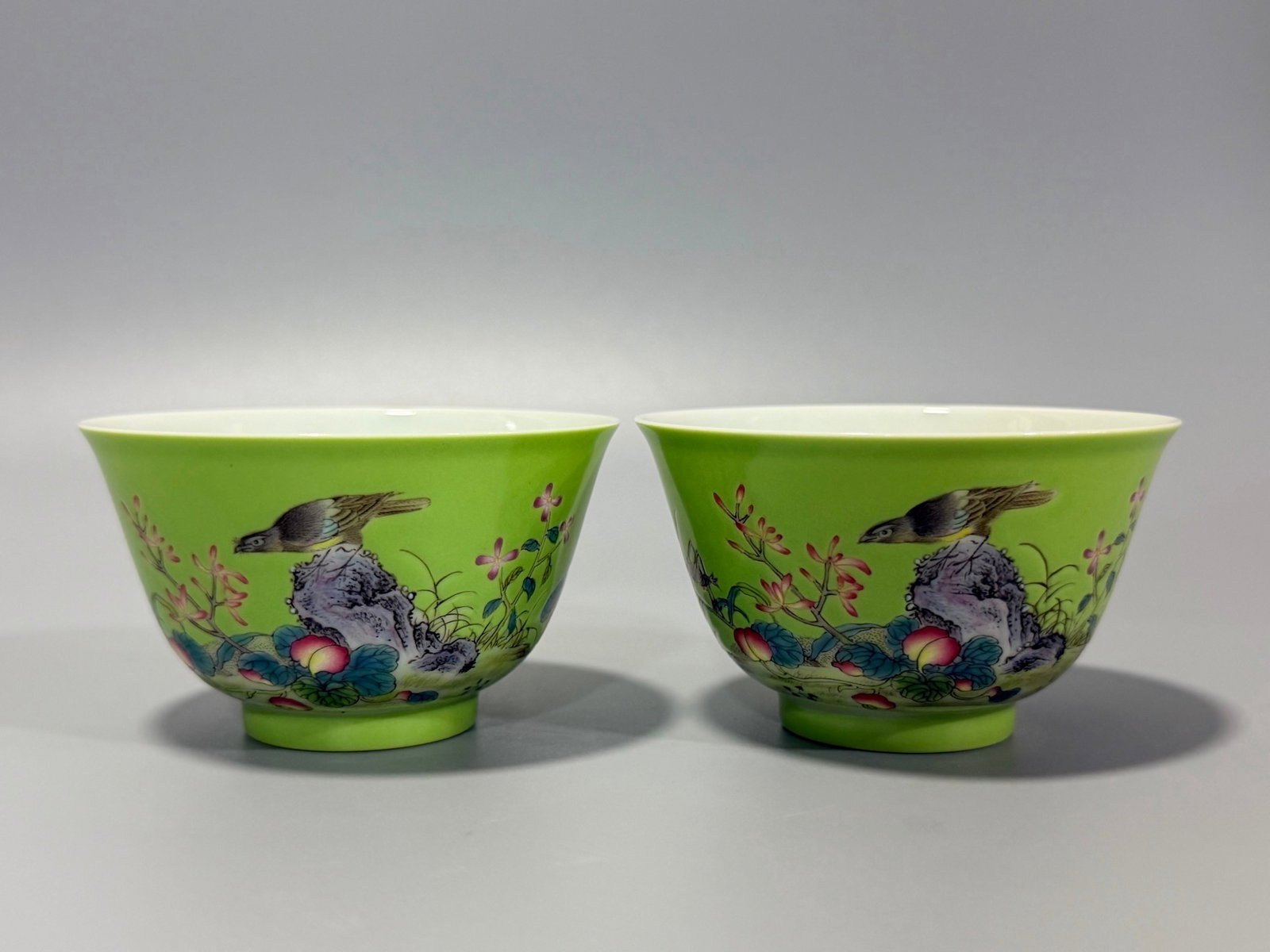 A Pair of Exquisite Green Ground Famille-Rose Flower and Bird Pattern Cups,with poem: A Pair of Exquisite Green Ground Famille-Rose Flower and Bird Pattern Cups,with poem,Qing Dynasty,China,Yongzheng Six-character Mark,Size:1.9inx3.1in 一对绿地粉彩&#