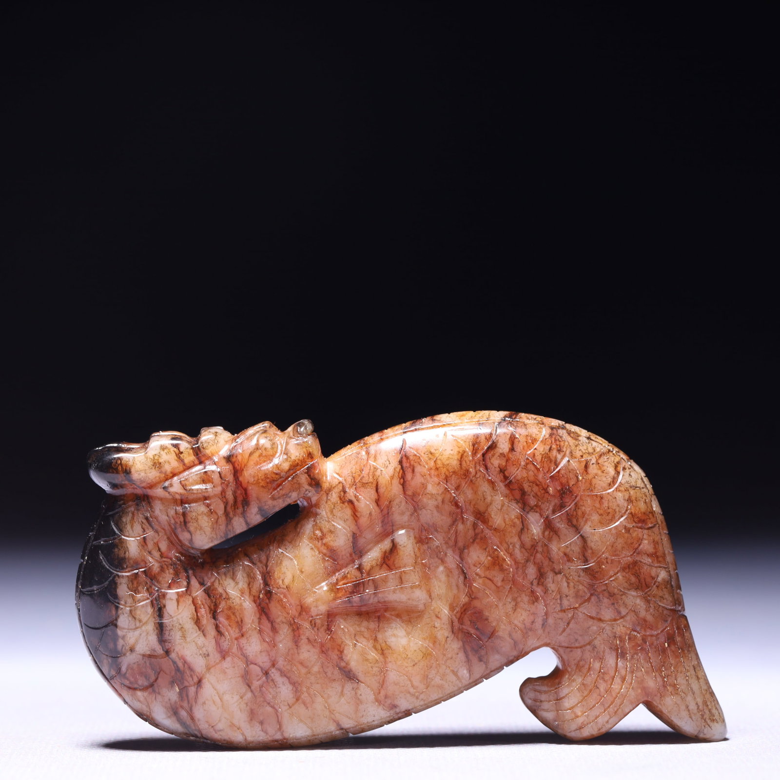 An Exquisite Archaic Jade Beast Ornament: An Exquisite Archaic Jade Beast Ornament,Ancient Time,China,Size:3.5inx0.6in,Weight:130g 高古玉兽摆件,中国远古时期