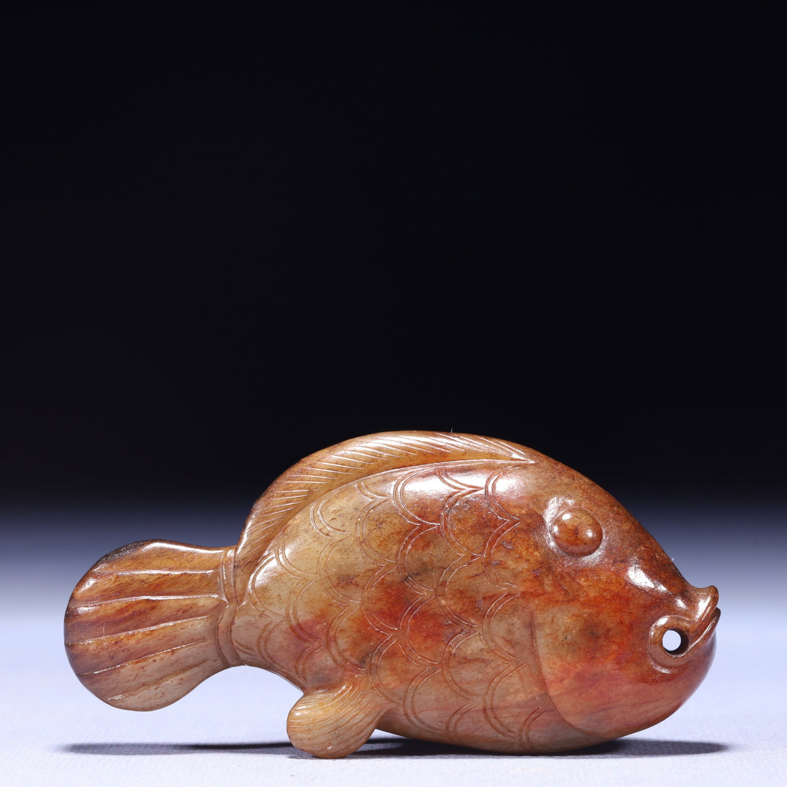 An Exquisite Archaic Jade Fish Ornament: An Exquisite Archaic Jade Fish Ornament,Ancient Time,China,Size:3.9inx0.8inx2in,Weight:157g 高古玉鱼摆件,中国远古时期