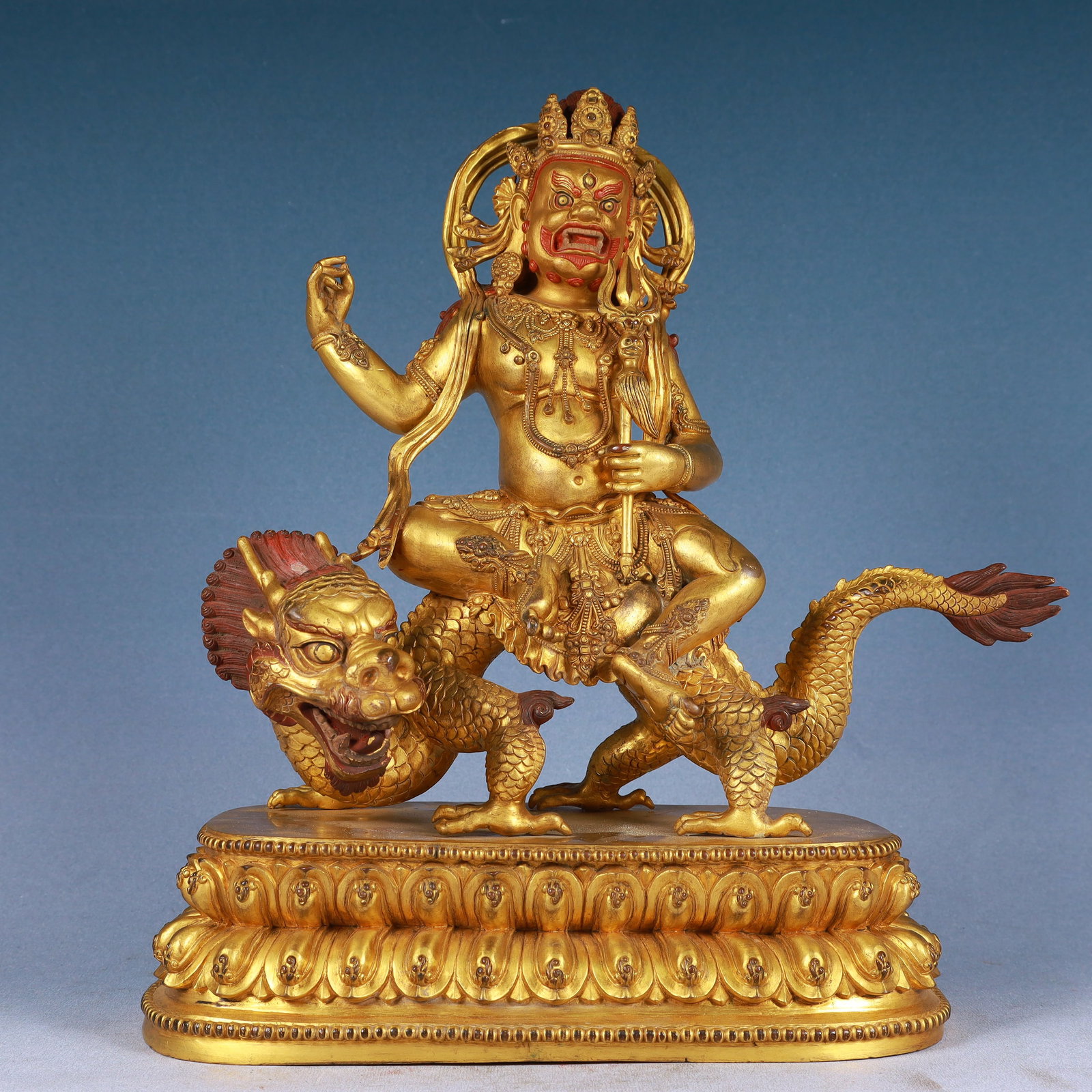 A Solemn Gilt Bronze Statue of Mammon Rides the Dragon: A Solemn Gilt Bronze Statue of Mammon Rides the Dragon,Qing Dynasty, China,Size:13.8inx5.9inx15.4in,Weight:10200g 铜鎏金骑龙财神像,中国ę