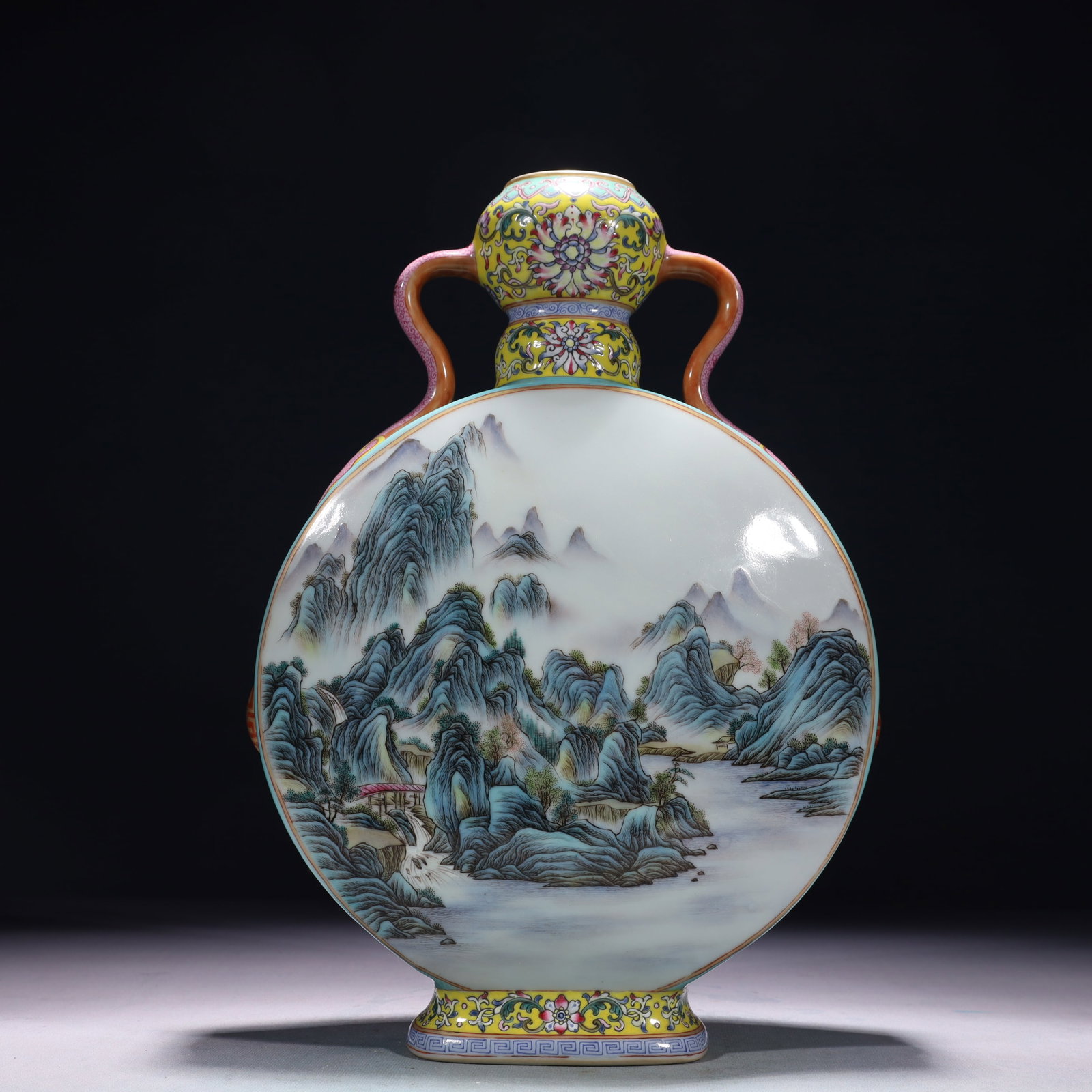 An Exquisite Turquoise Glazed Famille-Rose Landscape Pattern Double-Ears Vase: An Exquisite Turquoise Glazed Famille-Rose Landscape Pattern Double-Ears Vase,Qing Dynasty,China,Qianlong Six-character Mark,Size:9.1inx3.1inx13.8in,Weight:3300g 松石绿釉౴
