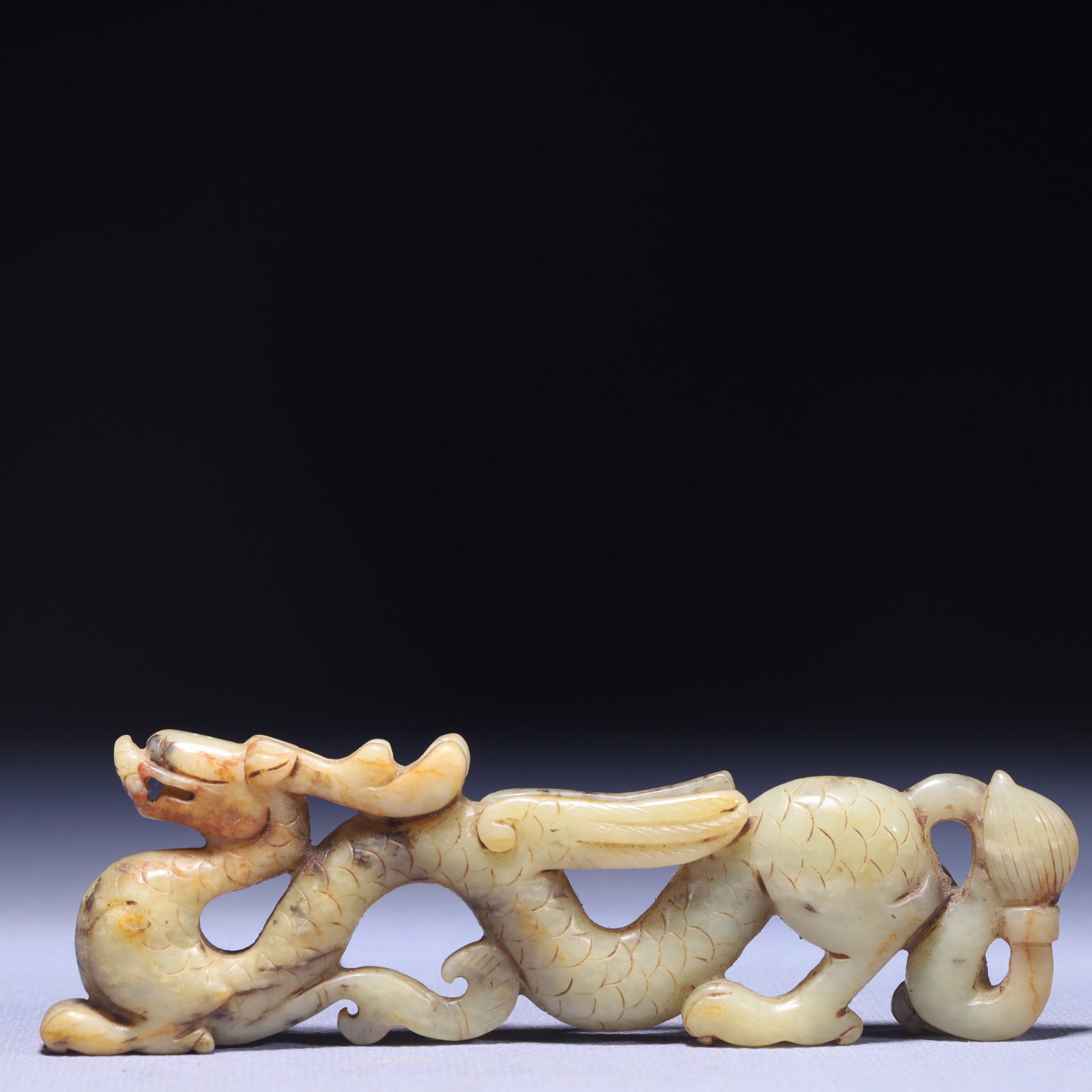An Exquisite White Jade Dragon Ornament: An Exquisite White Jade Dragon Ornament,Qing Dynasty,China,Size:5.1inx0.4inx1.6in,Weight:92g 白玉龙摆件,中国清代