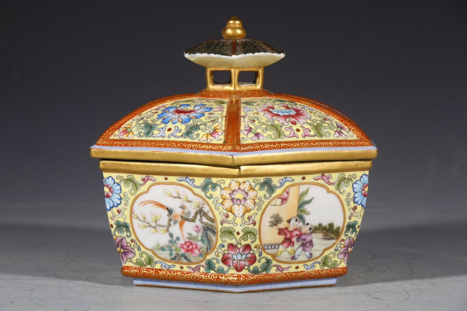 An Exquisite Yellow Ground Famille-Rose Lotus Pattern Jar with Cover: An Exquisite Yellow Ground Famille-Rose Lotus Pattern Jar with Cover,Qing Dynasty,China,Qianlong Four-character Mark,Size:5.9inx7.1in 黄地粉彩缠枝莲纹&#