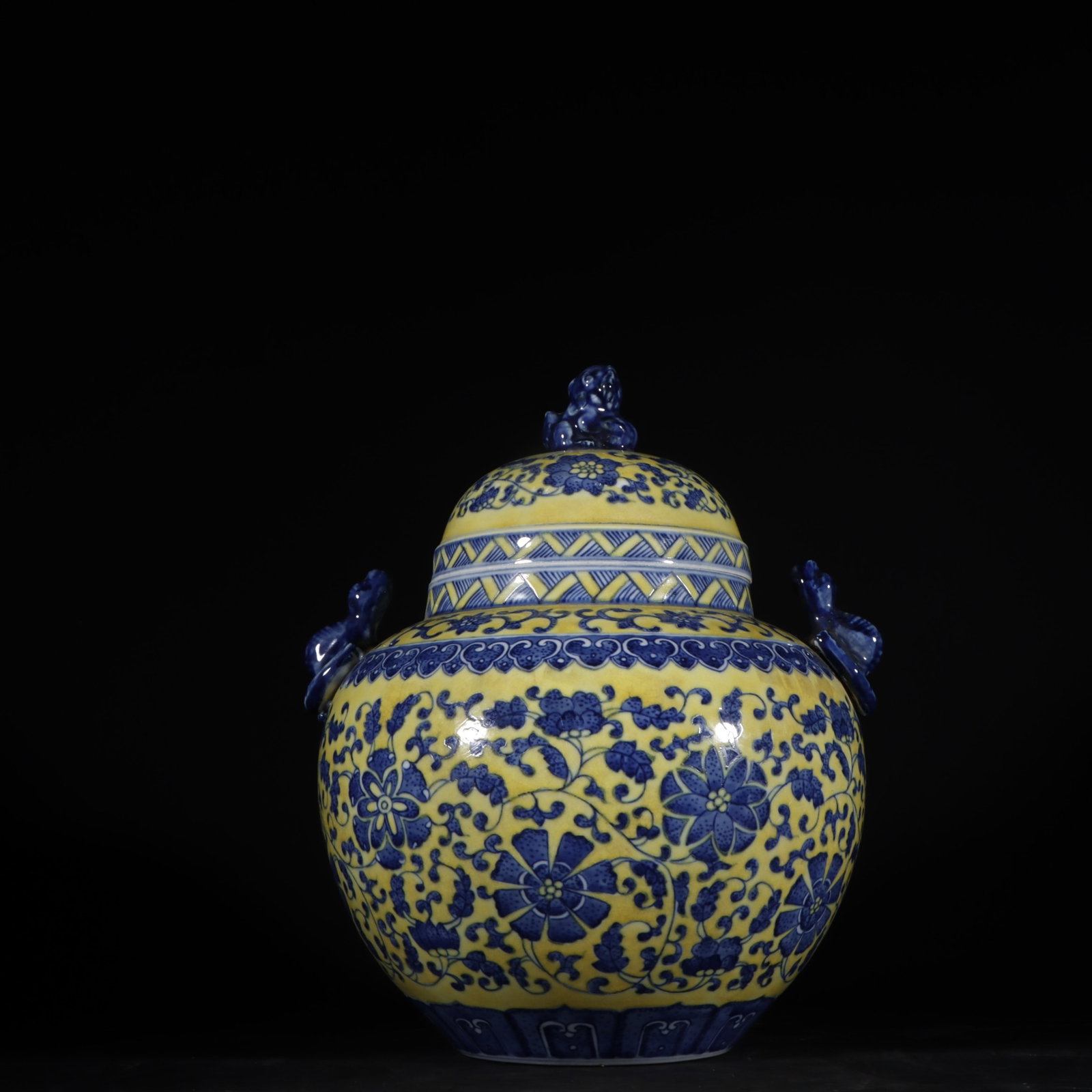 An Exquisite Yellow Ground Blue and White Lotus Pattern Double-Ears Jar with Cover: An Exquisite Yellow Ground Blue and White Lotus Pattern Double-Ears Jar with Cover,Qing Dynasty,China,Qianlong Six-character Mark,Size:9.6inx8.3in 黄地青花缠枝ő