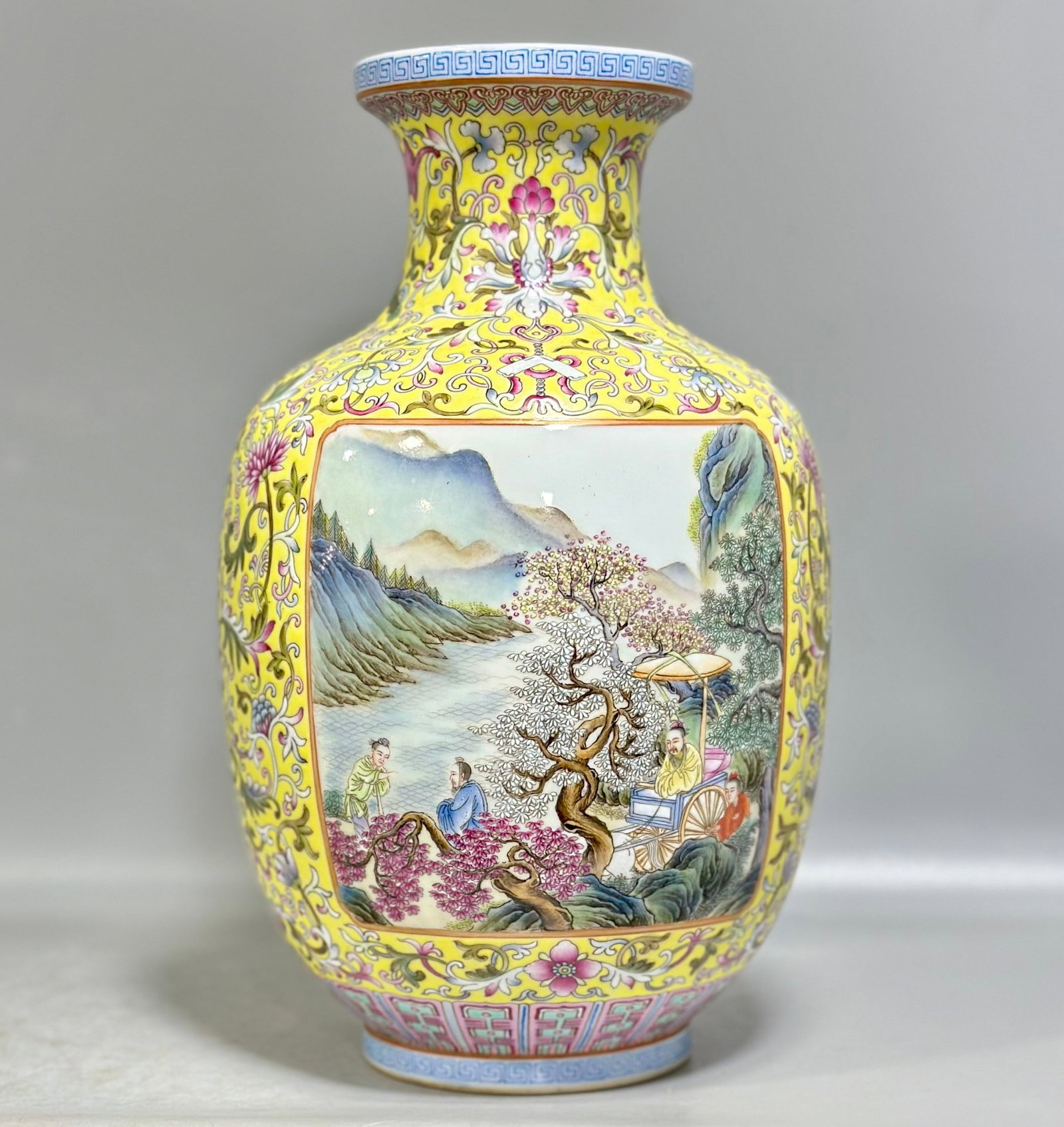 An Exquisite Yellow Ground Famille-Rose Character and Story Pattern Vase: An Exquisite Yellow Ground Famille-Rose Character and Story Pattern Vase,Qing Dynasty,China,Qianlong Four-character Mark,Size:10.8inx6.7in 黄地粉彩人物故É